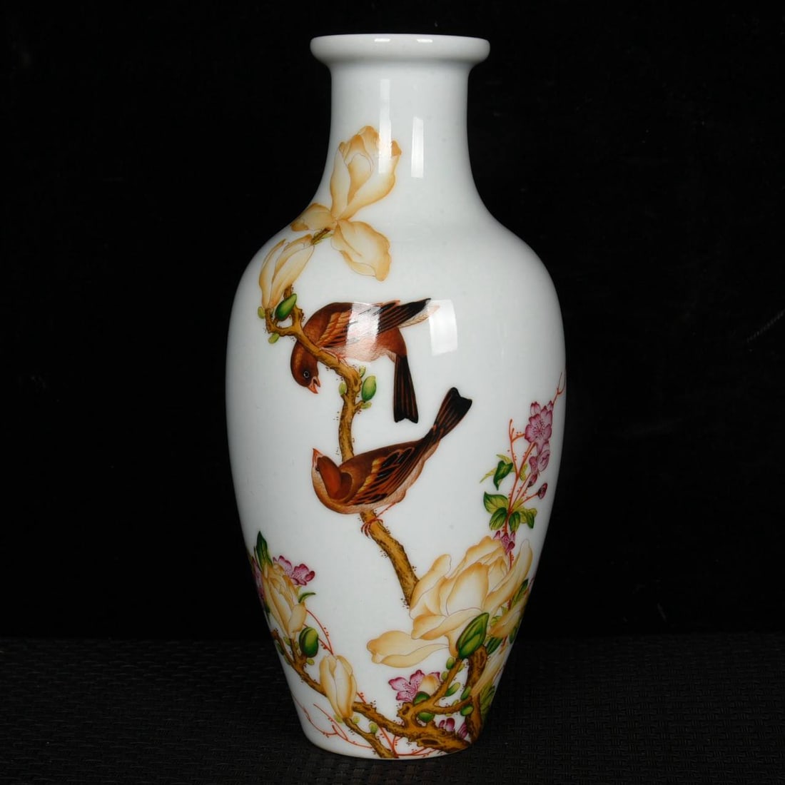 A Qing Dynasty Qianlong period famille rose enamel vase with floral and bird design: A Qing Dynasty Qianlong period famille rose enamel vase with floral and bird design by Giuseppe Castiglione (Lang Shining). Height: 17.8 cm, Diameter: 9 cm.