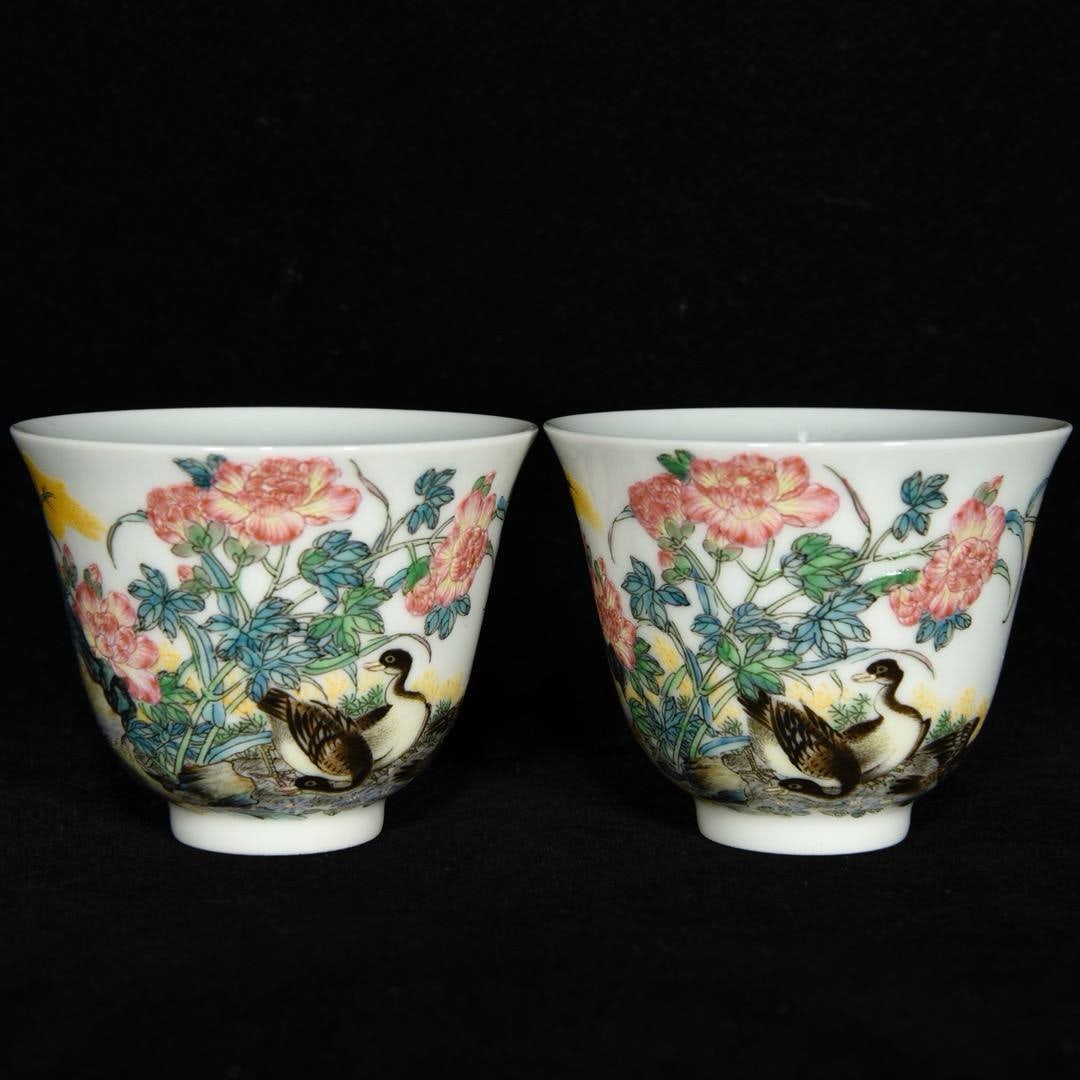 A Qing Dynasty Yongzheng period famille rose cup with reed and goose design: A Qing Dynasty Yongzheng period famille rose cup with reed and goose design, 5.1 x 6.5 cm.