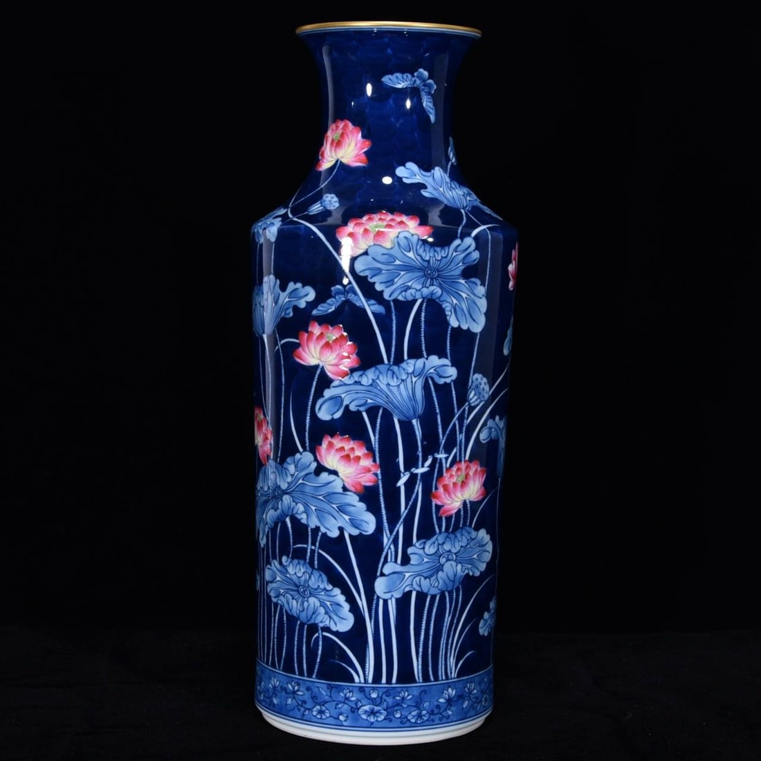 A blue and white porcelain vase with lotus and winter melon design: A blue and white porcelain vase with lotus and winter melon design from the Jiaqing period of the Qing Dynasty, 34.5 cm high and 13 cm in diameter.