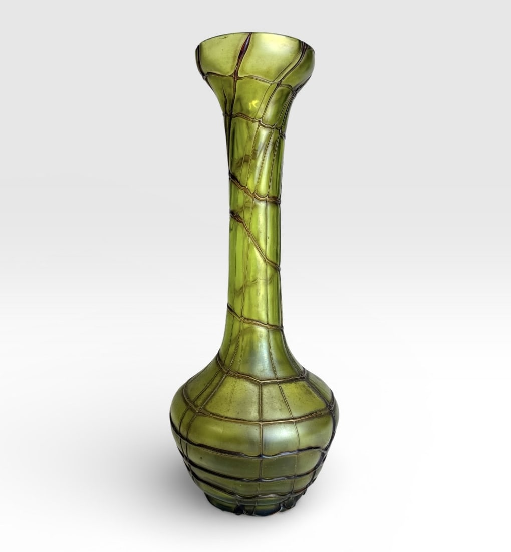 Bohemian Art Nouveau glass vase: Art Nouveau Bohemian glass vase, likely by Kralik. The green glass has iridescent reflections and is decorated with brown glass thread motifs applied across its entire surface. Unsigned, 32cm.