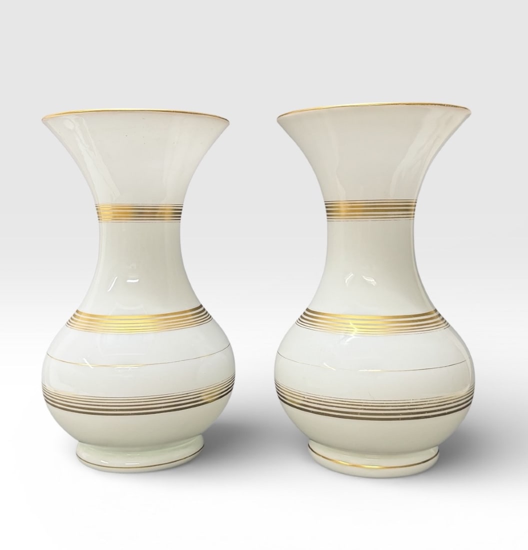 Baccarat, pair of white opaline vases with gold motifs: Pair of large Baccarat white opaline vases, baluster-shaped, decorated with gilt. In perfect condition, showing only slight wear to the gilding (see photos). Height: 31 cm, diameter: 16 cm.