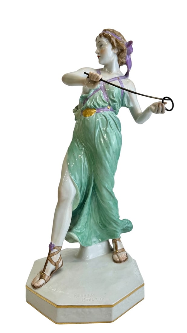 Meissen - Large Art Nouveau figure - Reinhold Boeltzig: Large Art Nouveau Meissen porcelain figure of a woman playing with a hoop and stick (Reifenspielerin mit Stab), with a metal ring and stick. Created by Reinhold Boeltzig in 1909. Signed on the base, w