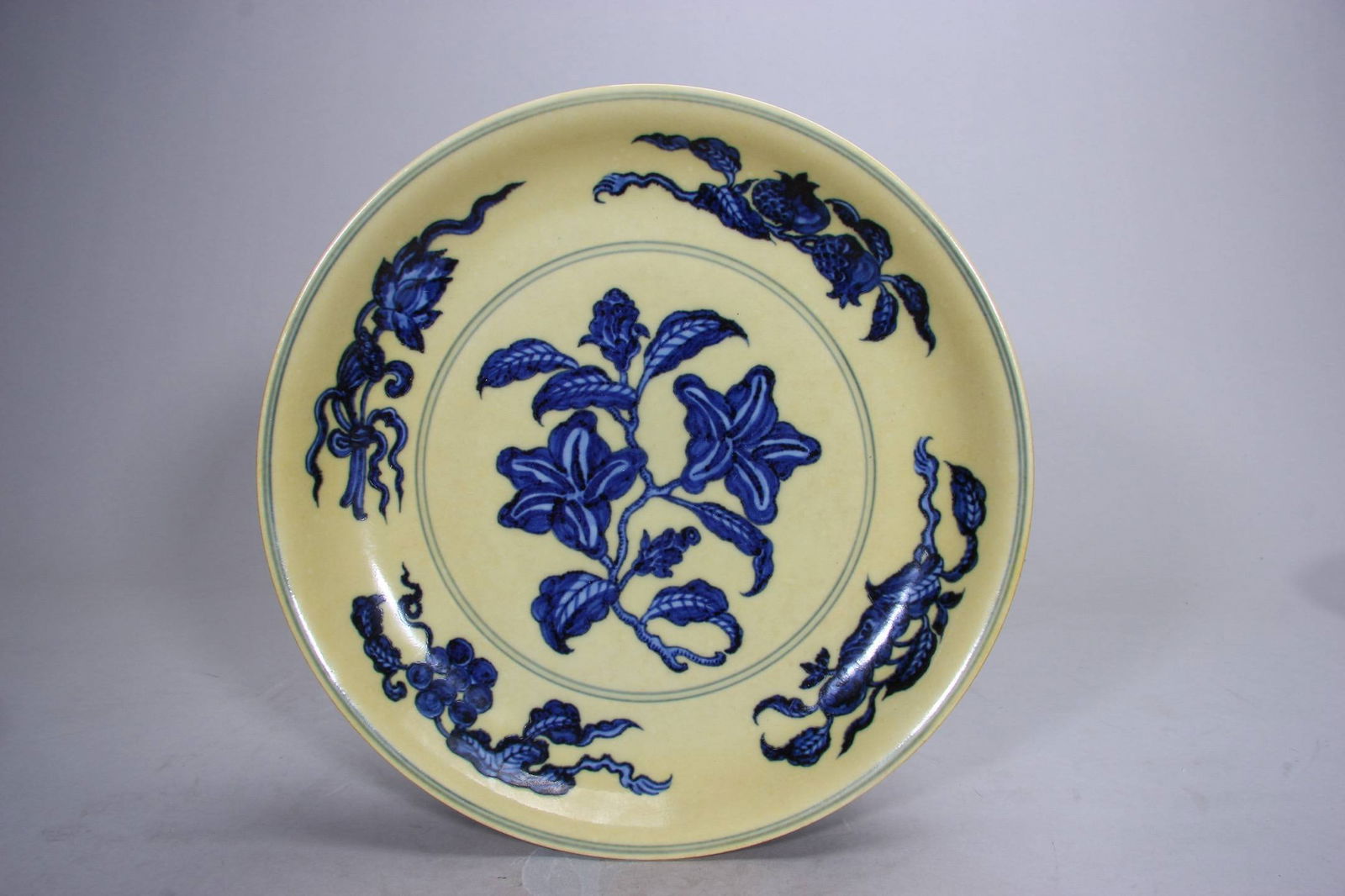 Ming Dynasty, Hongzhi Period, Yellow Ground Blue and White Floral Pattern Plate: Ming Dynasty, Hongzhi Period, Yellow Ground Blue and White Floral Pattern Plate, Diameter 26.7 cm