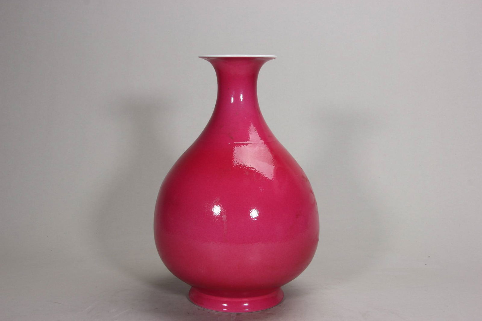 A Qing Dynasty Xuantong period rouge-red glazed Yuhuchun vase: A Qing Dynasty Xuantong period rouge-red glazed Yuhuchun vase, 28.2 cm high.