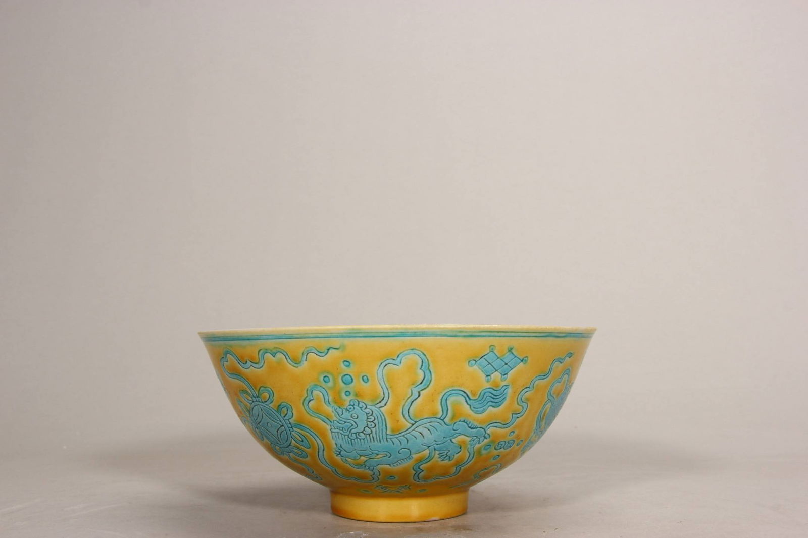 Ming Dynasty, Hongzhi Period, Yellow Ground with Blue Enamel "Auspicious Wishes" Bowl: Ming Dynasty, Hongzhi Period, Yellow Ground with Blue Enamel "Auspicious Wishes" Bowl. Height: 7.2 cm, Diameter: 15.7 cm.
