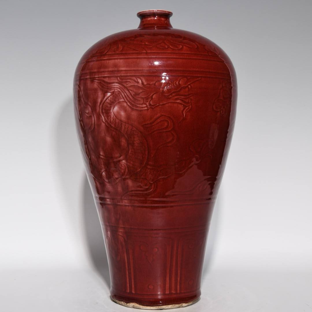 A Yuan dynasty sacrificial red glazed plum vase with dragon design (1 of 7)