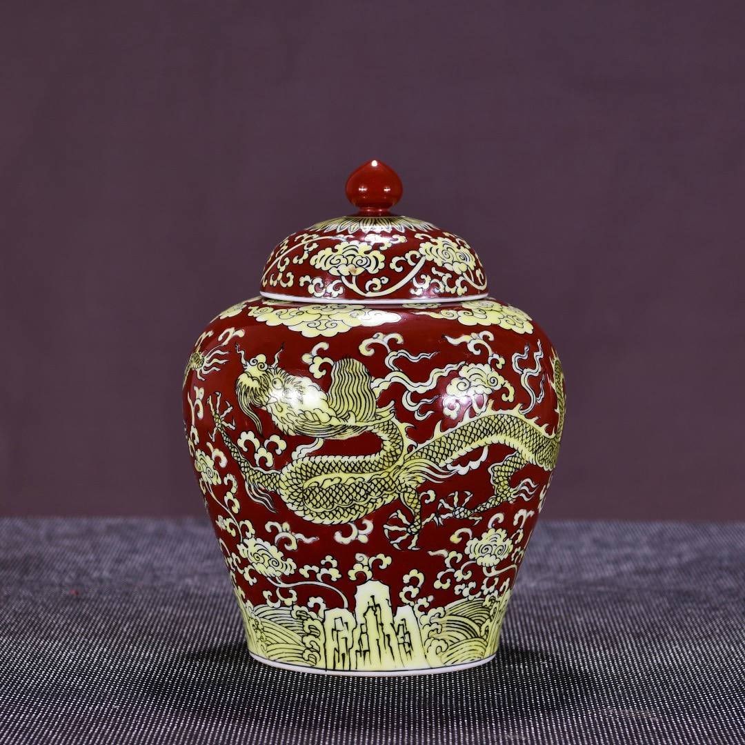A Ming Dynasty Jiajing period (1620-1620) red-ground yellow-enamel dragon-patterned covered jar: A Ming Dynasty Jiajing period (1620-1620) red-ground yellow-enamel dragon-patterned covered jar,Dimensions: Height 29 cm, Width 22 cm