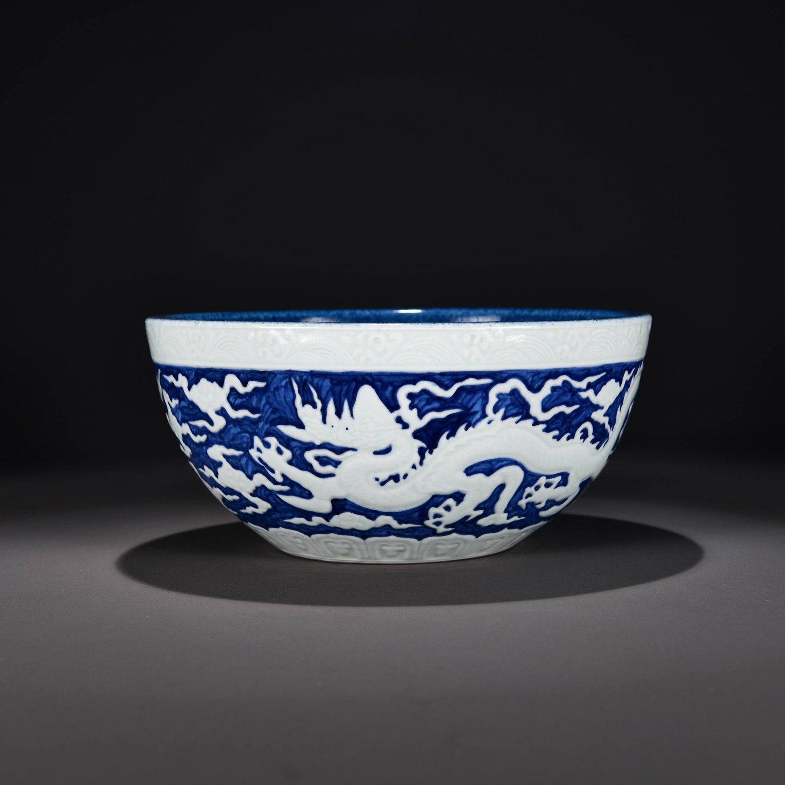 A Ming Xuande period blue-and-white porcelain bowl with a blue ground and white-sprinkled (1 of 6)