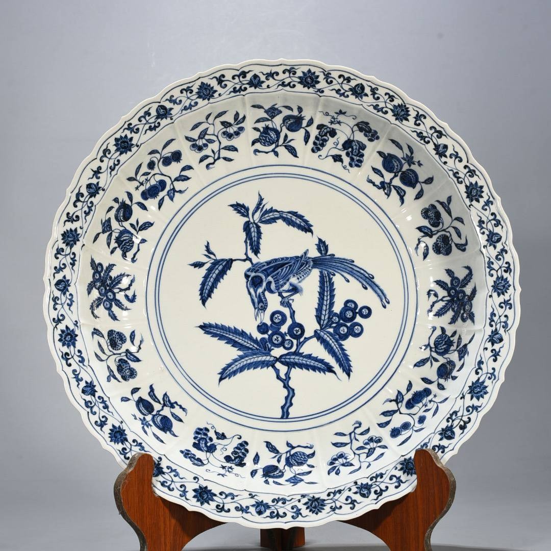 a Ming Yongle period blue and white porcelain dish with a design of a pipa (a Chinese lute) and bird (1 of 8)