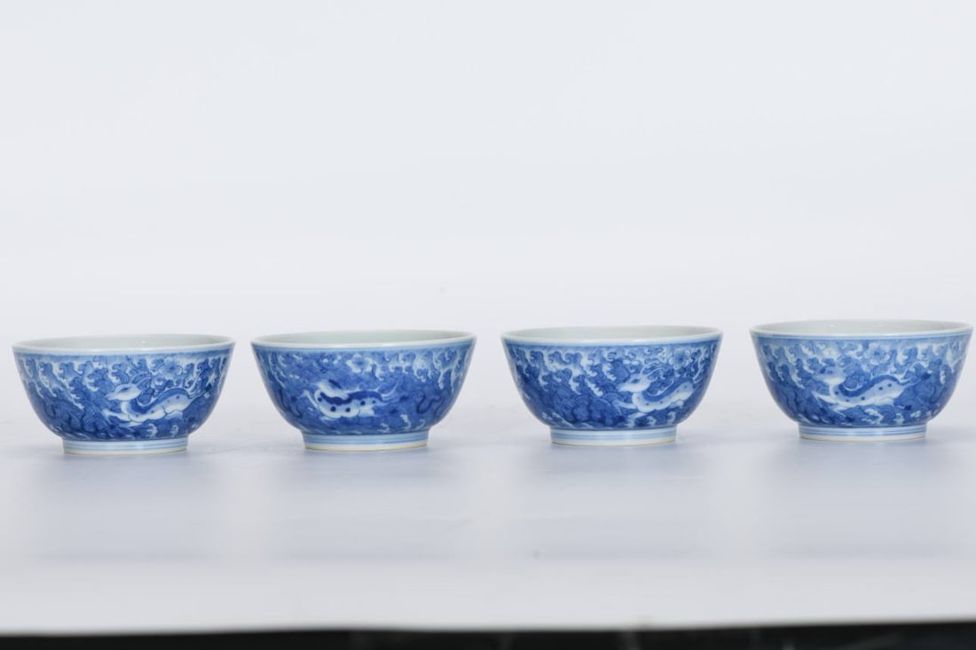 Four small blue-and-white porcelain bowls with seahorse motifs, dating from the Yongzheng period: Four small blue-and-white porcelain bowls with seahorse motifs, dating from the Yongzheng period of the Qing Dynasty. Each bowl is 4.2 cm high and 8.6 cm in diameter.
