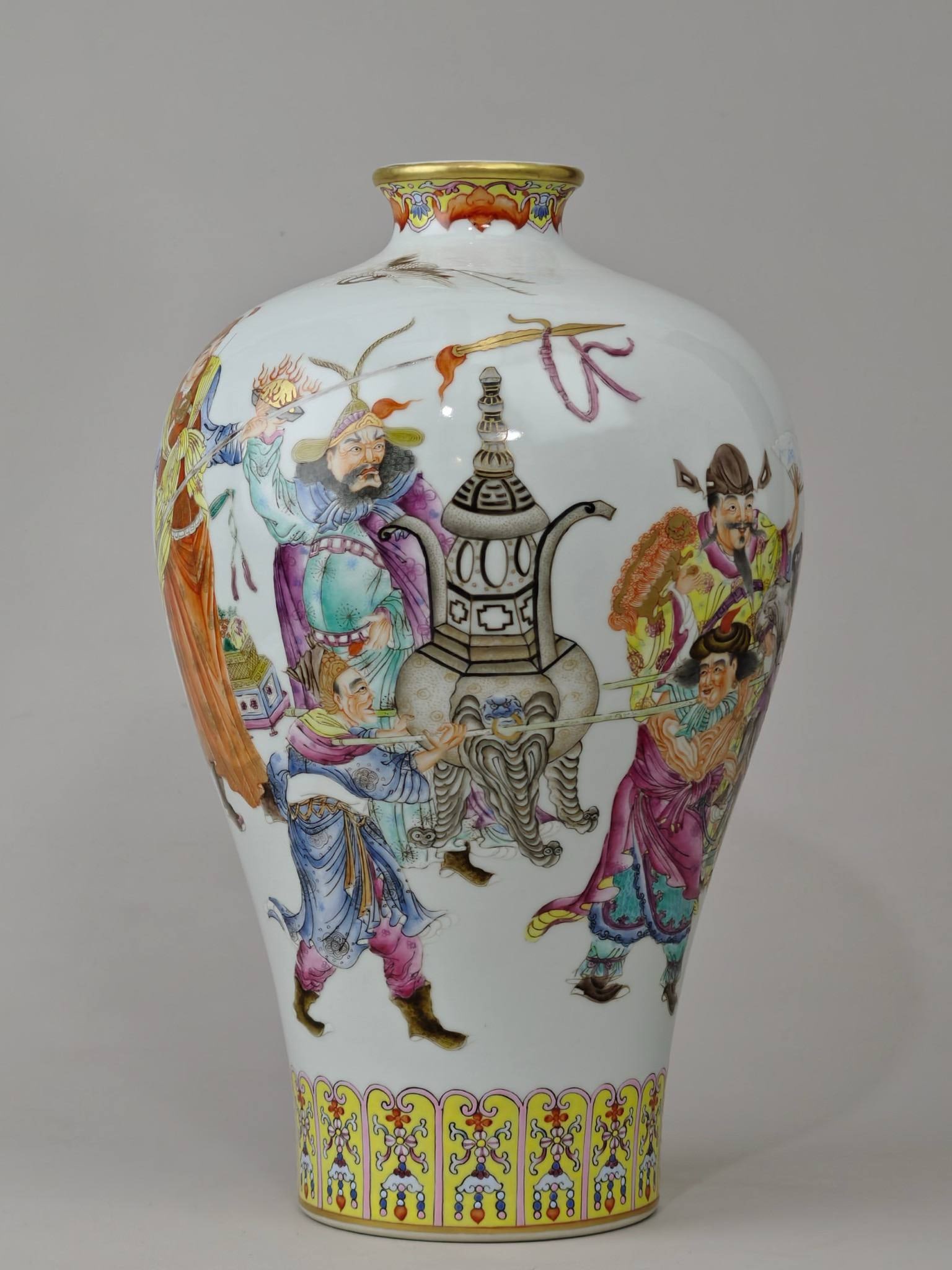 A famille rose plum vase with the design of "Eight Barbarians Presenting Treasures (1 of 9)