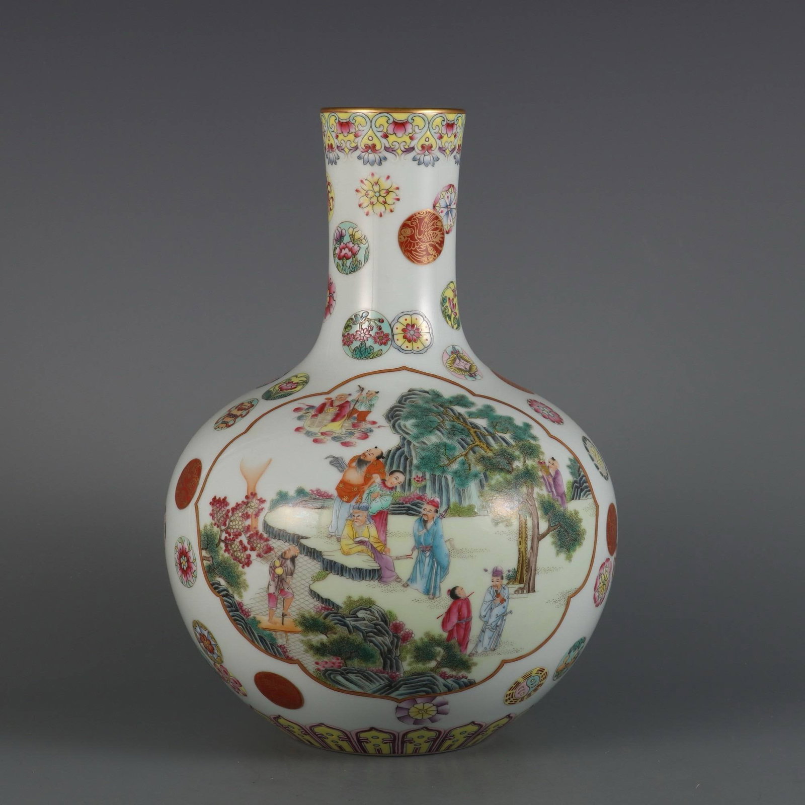 A famille rose vase with a design of immortals and flowers in openwork (1 of 9)