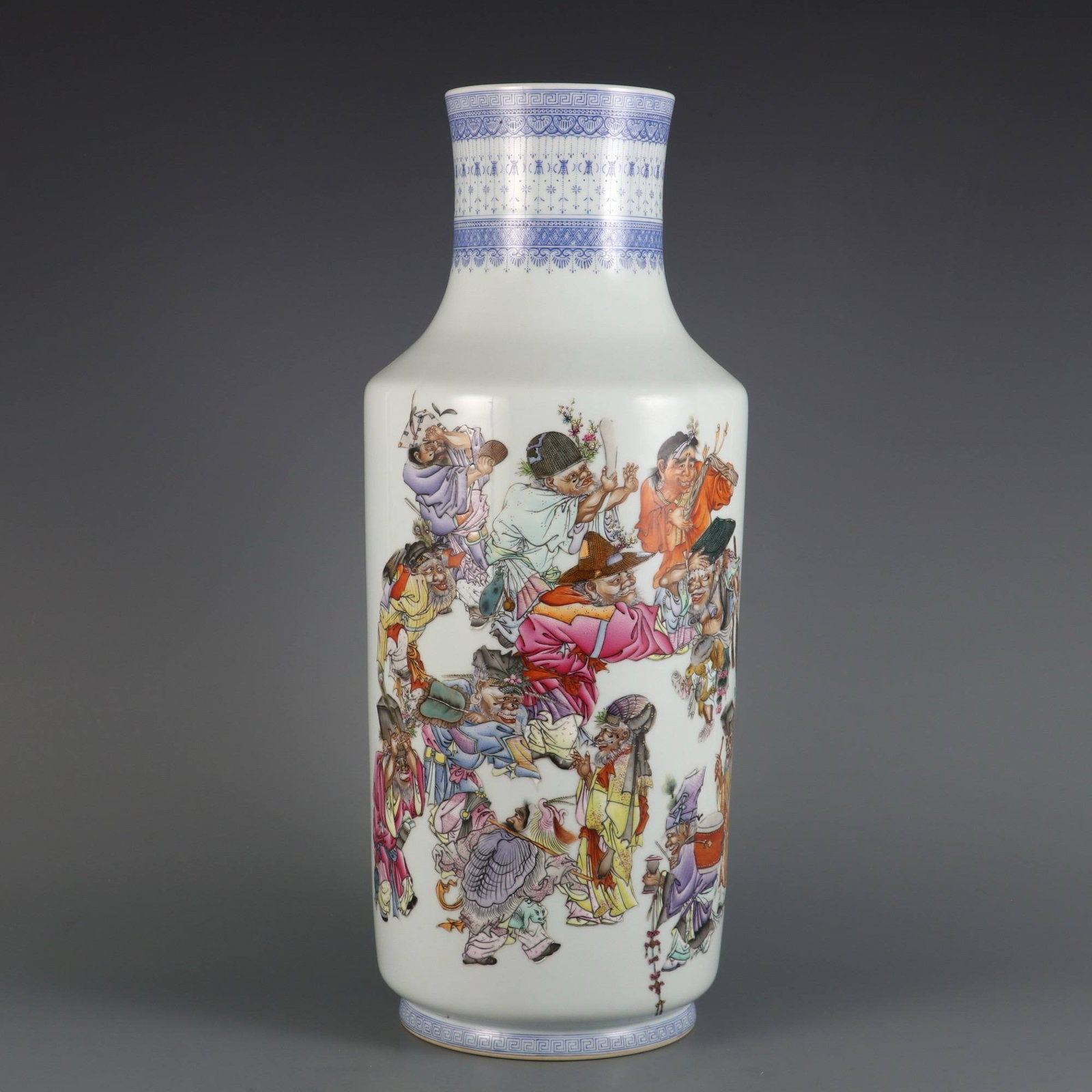 A Qing Dynasty Yongzheng period famille rose enamel vase: A Qing Dynasty Yongzheng period famille rose enamel vase with a Nuo (exorcism) design. Dimensions: Height 45.8 cm, Belly diameter 18 cm, Mouth diameter 11 cm.