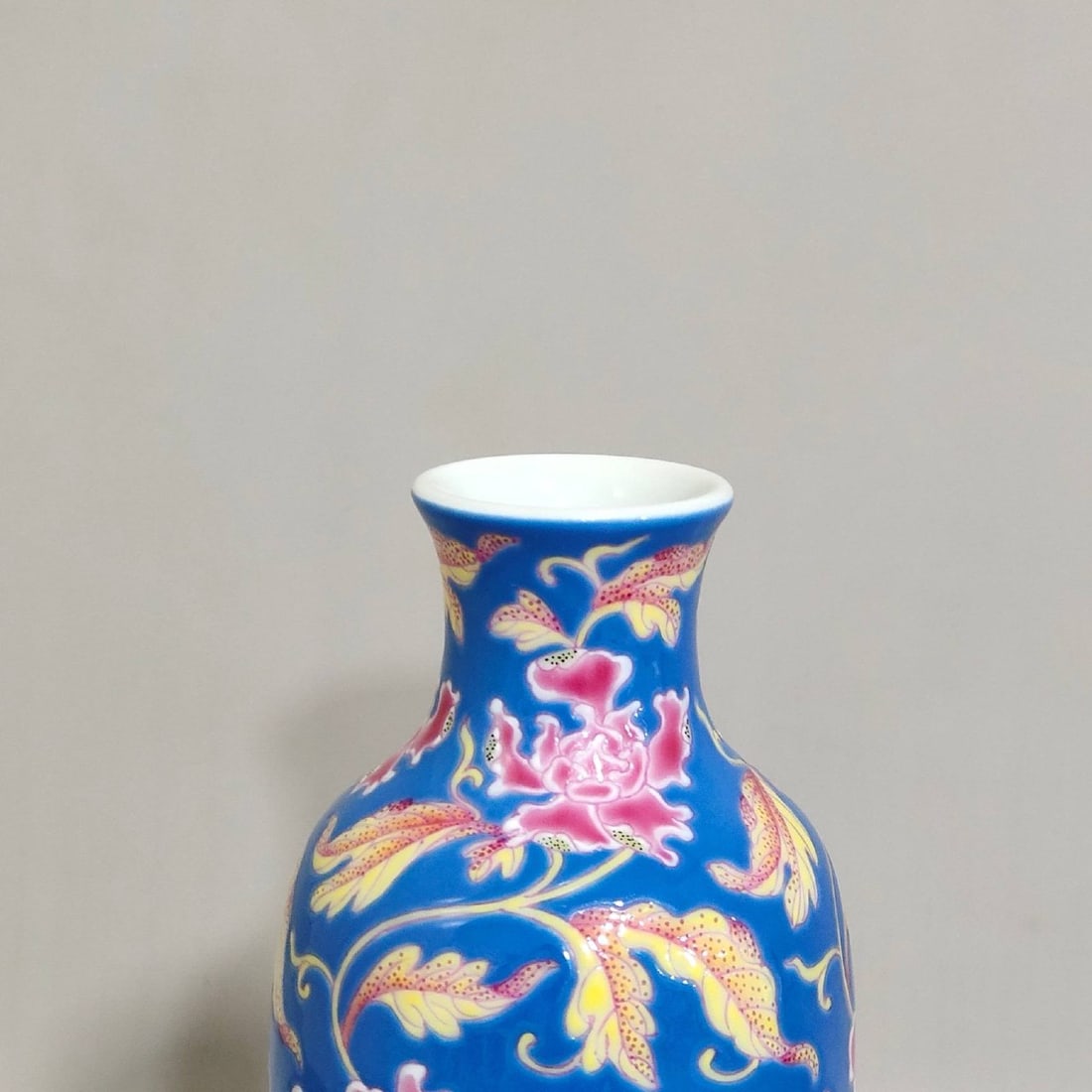 A small blue-glazed floral vase made by Emperor Kangxi (1 of 7)