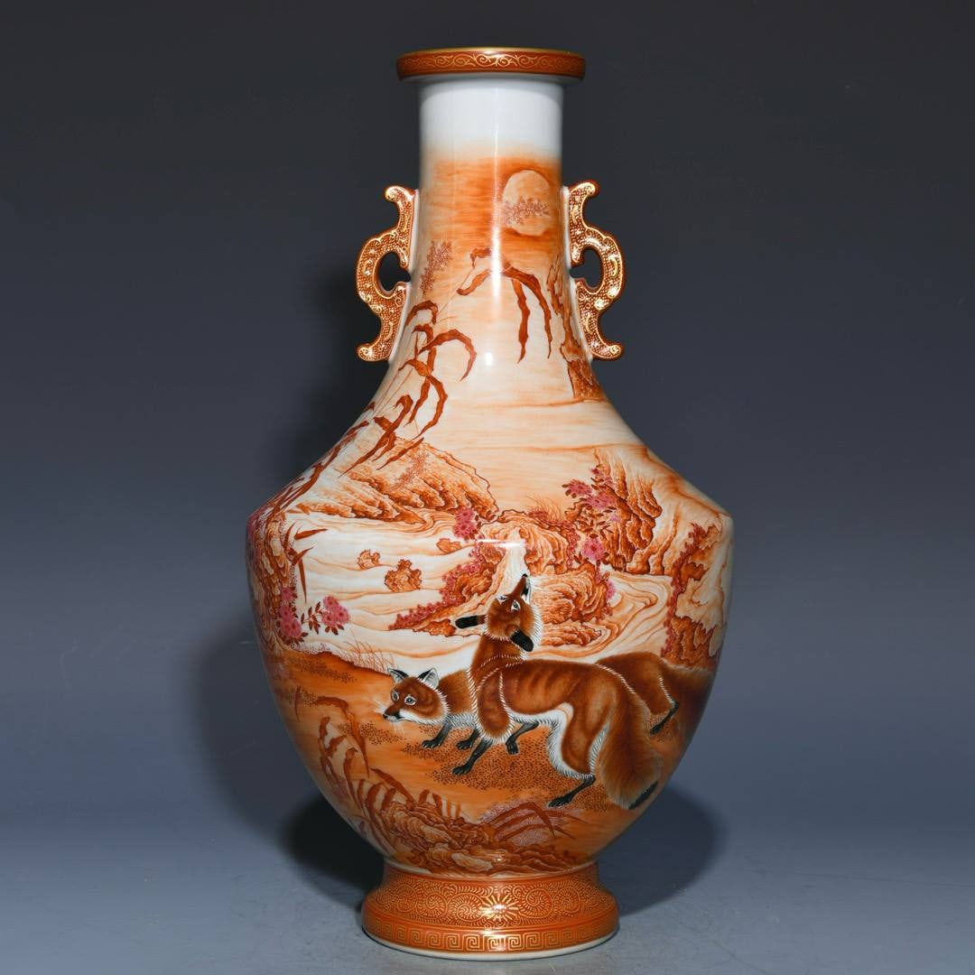 A Qing Dynasty Qianlong period (1760s) sand-red antique large: A Qing Dynasty Qianlong period (1760s) sand-red antique large Liangxing double-eared vase, 32.5cm high and 17cm in diameter.
