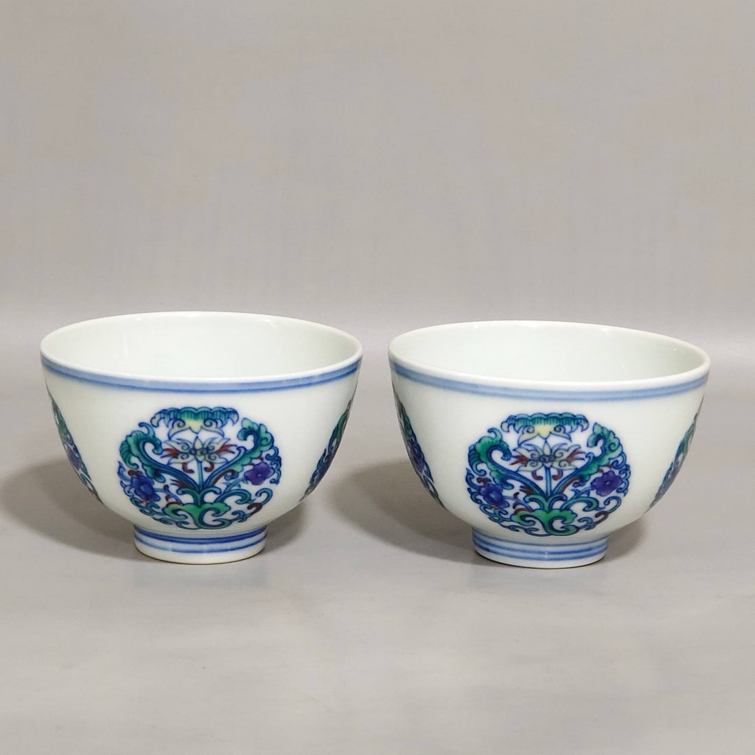 A pair of Qing Dynasty Yongzheng period doucai cups (1 of 8)