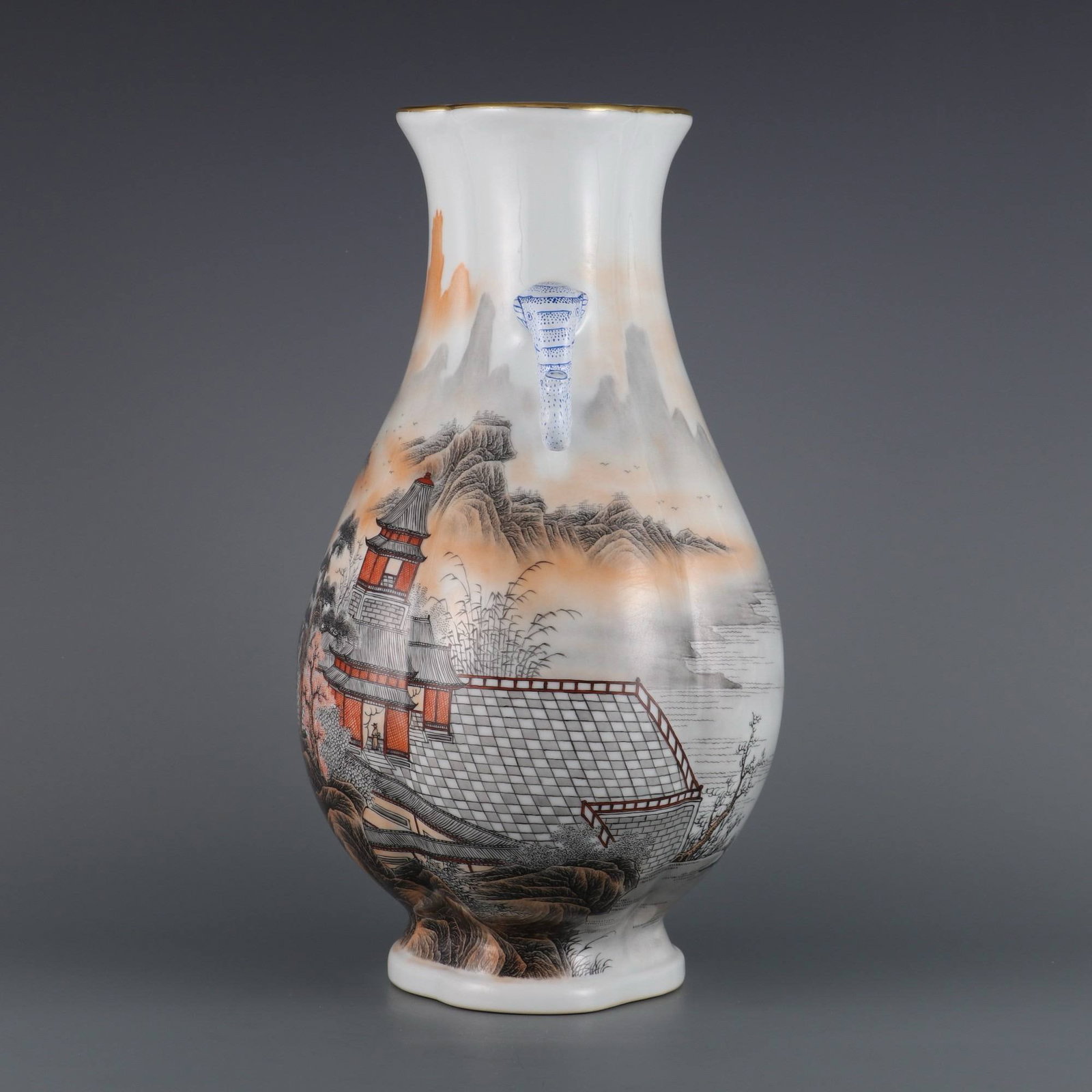 A Qing Dynasty Qianlong period: A Qing Dynasty Qianlong period (1736-1745) iron-red and ink-painted landscape, pavilion, elephant-ear, melon-shaped vase. Dimensions: Height 37 cm, Mouth Diameter 15.2 cm.
