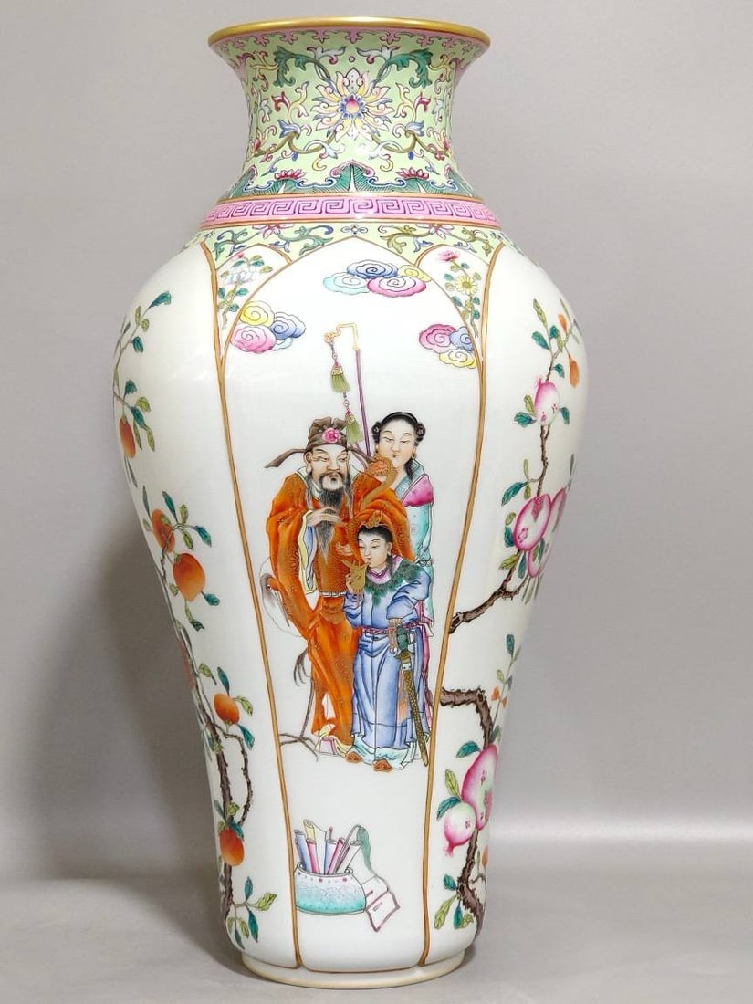 A Qing Dynasty Qianlong period plum vase: A Qing Dynasty Qianlong period plum vase depicting the Three Stars Giving a Child, 34.5 cm high and 17 cm in diameter.