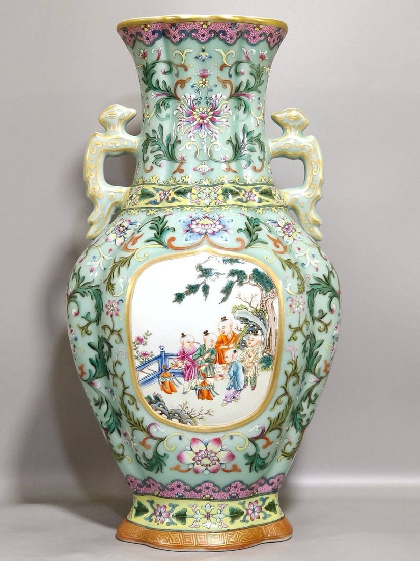 A celadon-glazed vase: A celadon-glazed vase with a windowed design of children at play, dating from the Qianlong period of the Qing dynasty. 45.5 cm high, 24 cm in diameter.