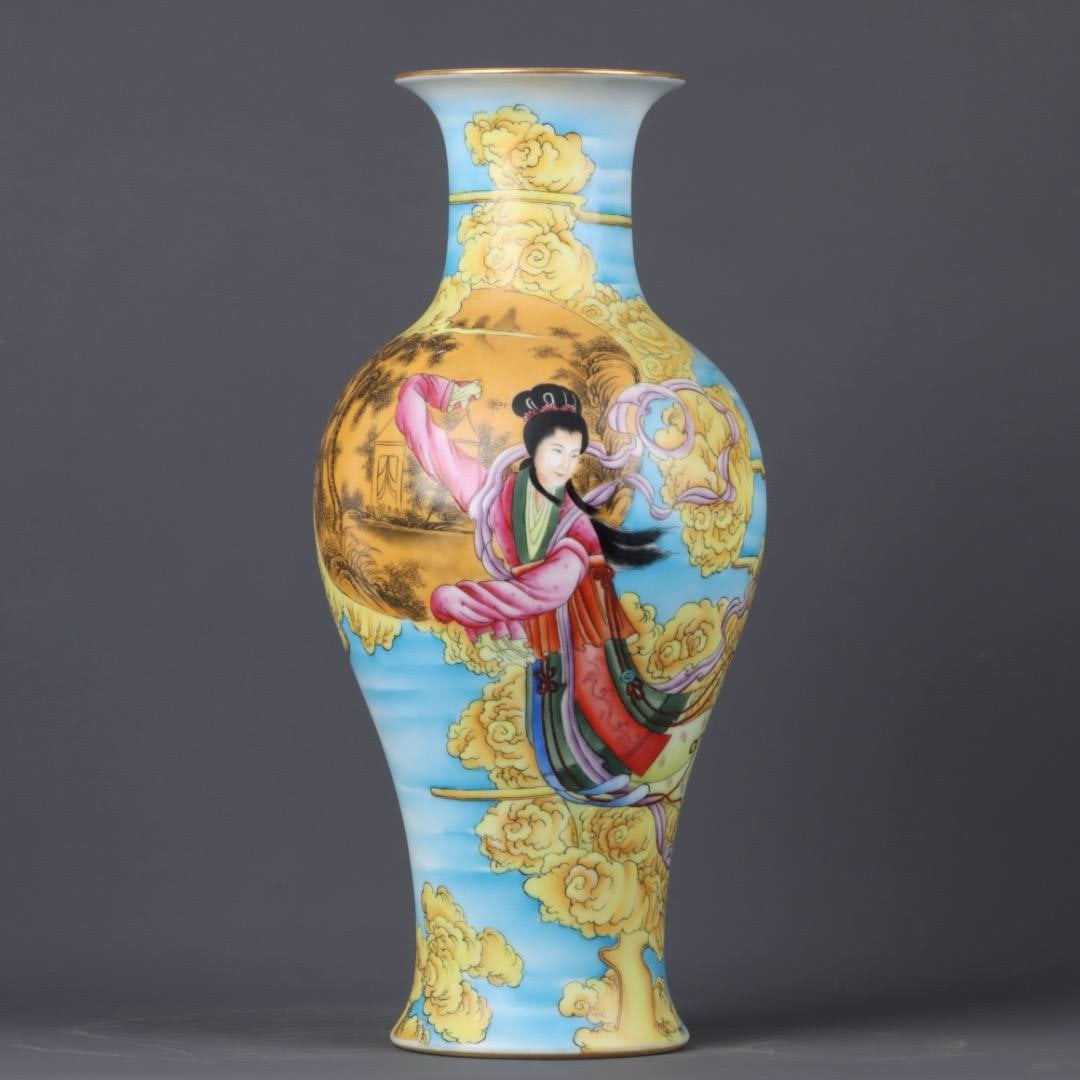 A pair of Qing Dynasty Qianlong period enamel-gilt Guanyin figure vases: Height and width: 40*19cm