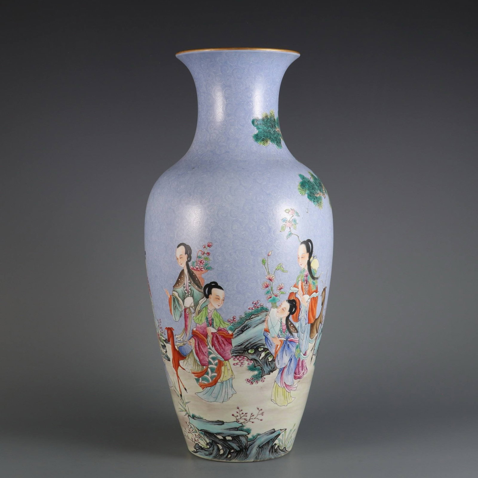 A blue-ground famille rose vase with seven fairy maidens: A blue-ground famille rose vase with seven fairy maidens, made during the Qianlong period of the Qing dynasty. Dimensions: Height 42.8 cm, belly diameter 19.5 cm, mouth diameter 13 cm.