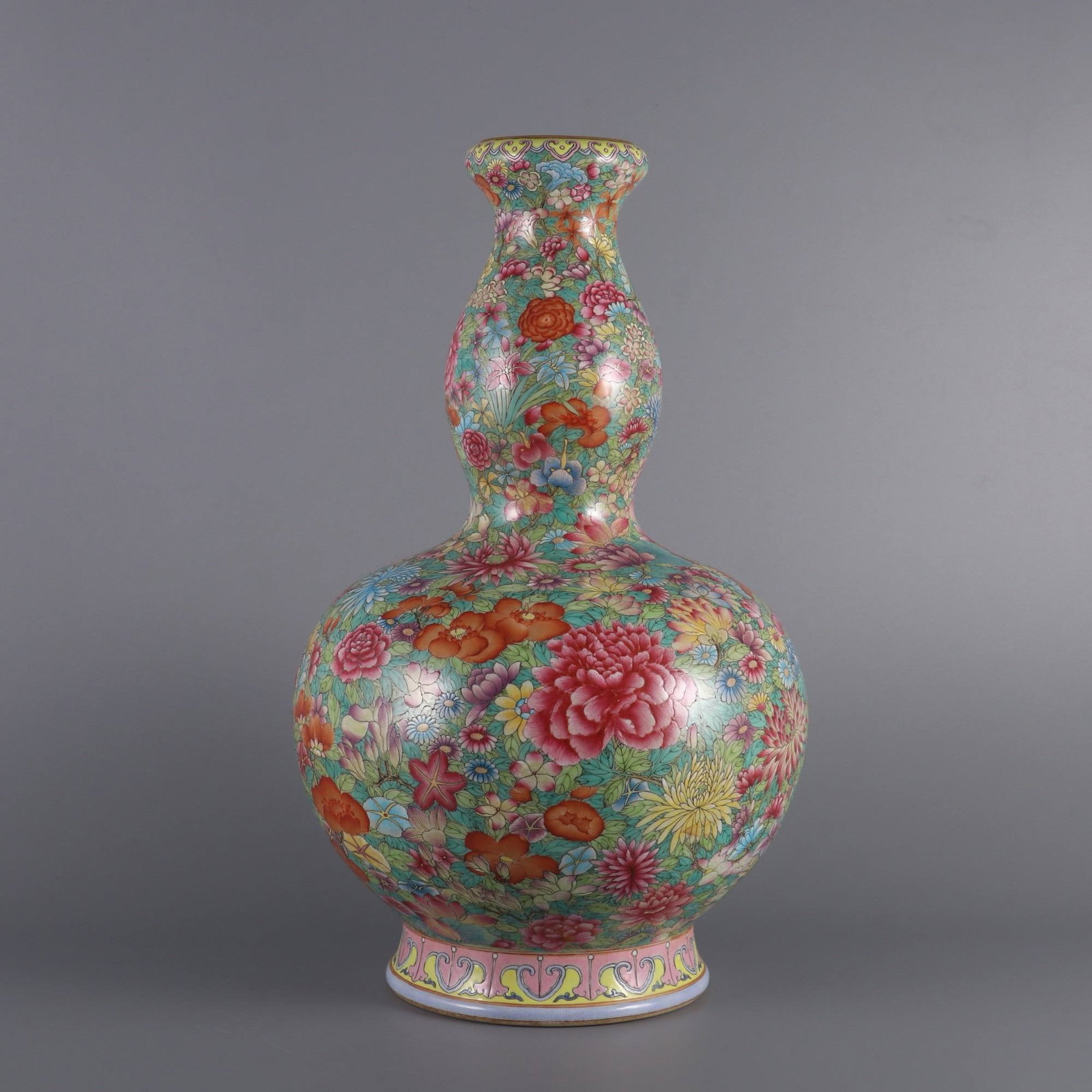 A Qianlong-era (1736-1745) famille rose gourd-shaped vase (1 of 9)