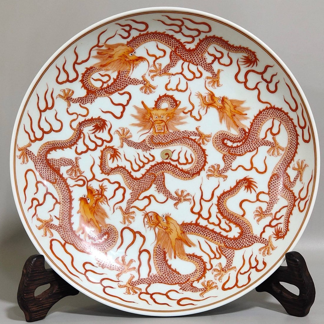 A Qing Dynasty Guangxu period iron-red five-dragon plate (1 of 7)