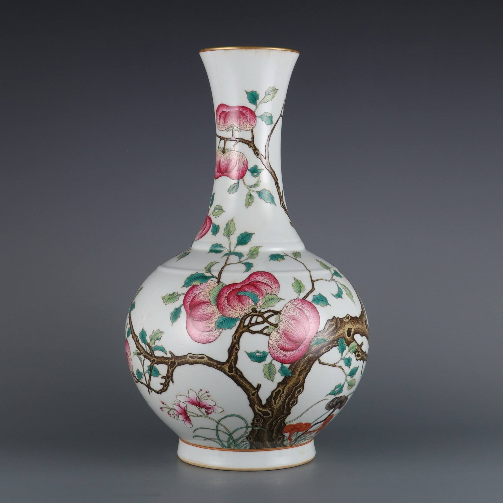 A Qing Dynasty Guangxu period famille rose vase: A Qing Dynasty Guangxu period famille rose vase with a design of auspicious symbols symbolizing longevity and good fortune. Dimensions: Height 40.8 cm, Mouth Diameter 10 cm.
