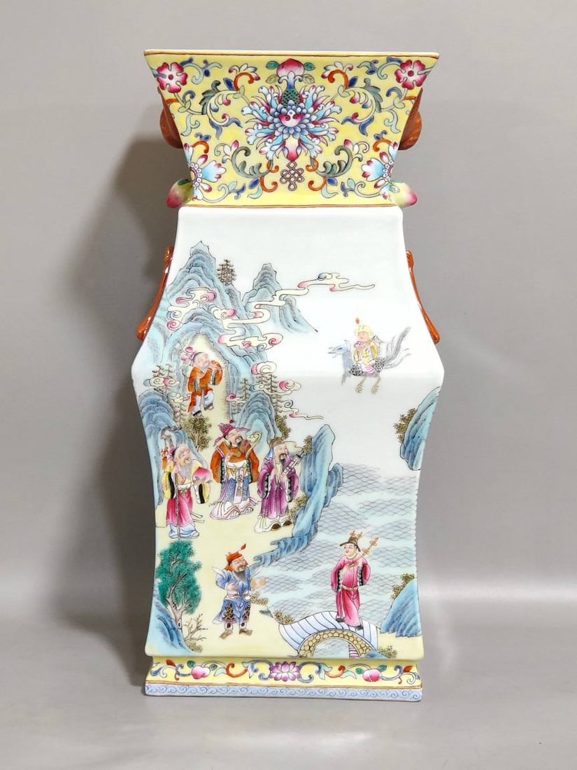 A square vase with two handles on a yellow background, decorated with a scene of immortals gathering: A square vase with two handles on a yellow background, decorated with a scene of immortals gathering, made by Shendetang. It is 30.3 cm high and 14.5 cm in diameter.