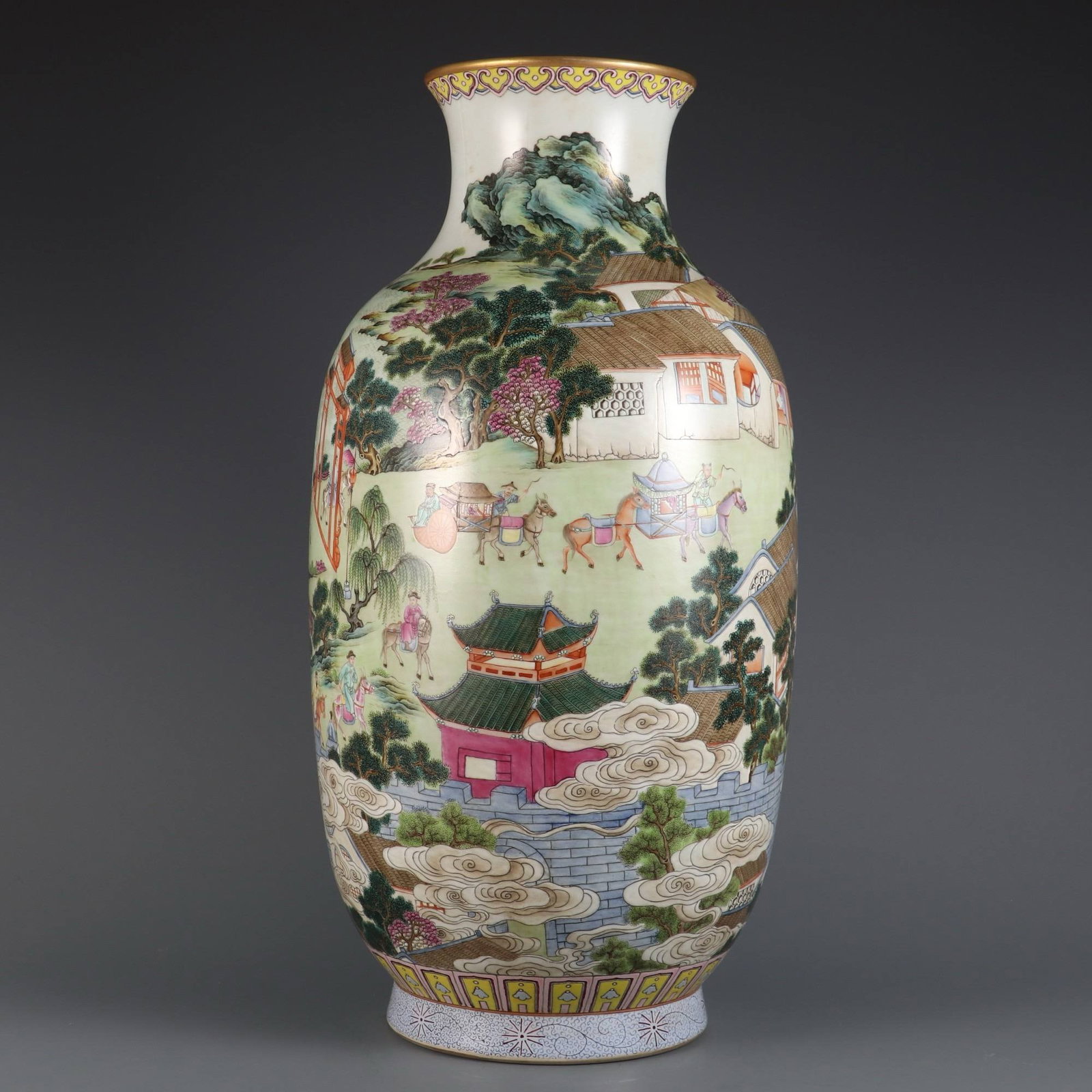 A large cylindrical vase: A large cylindrical vase with a famille rose design depicting a journey to Beijing for the imperial examinations, made during the Qianlong reign of the Qing dynasty. Dimensions: Height 52.6 cm, Belly 