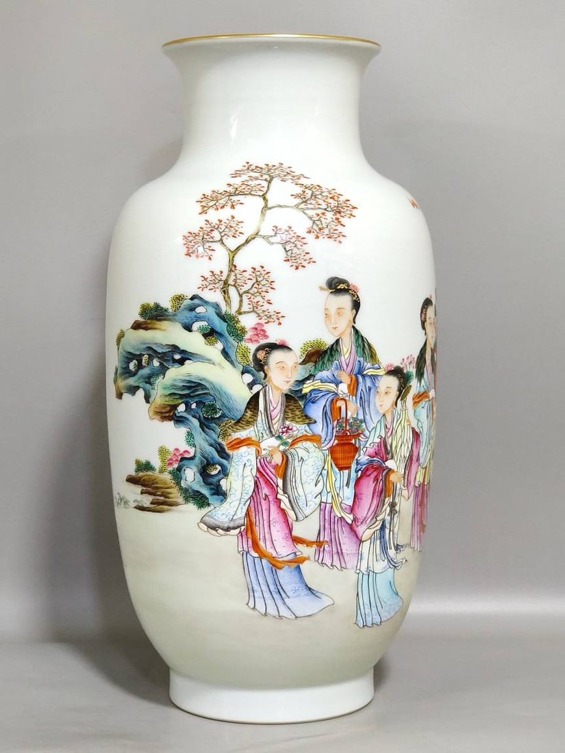 A Qing Dynasty Qianlong period vase: A Qing Dynasty Qianlong period vase depicting seven fairy maidens celebrating longevity, 32.5 cm high and 15 cm in diameter.