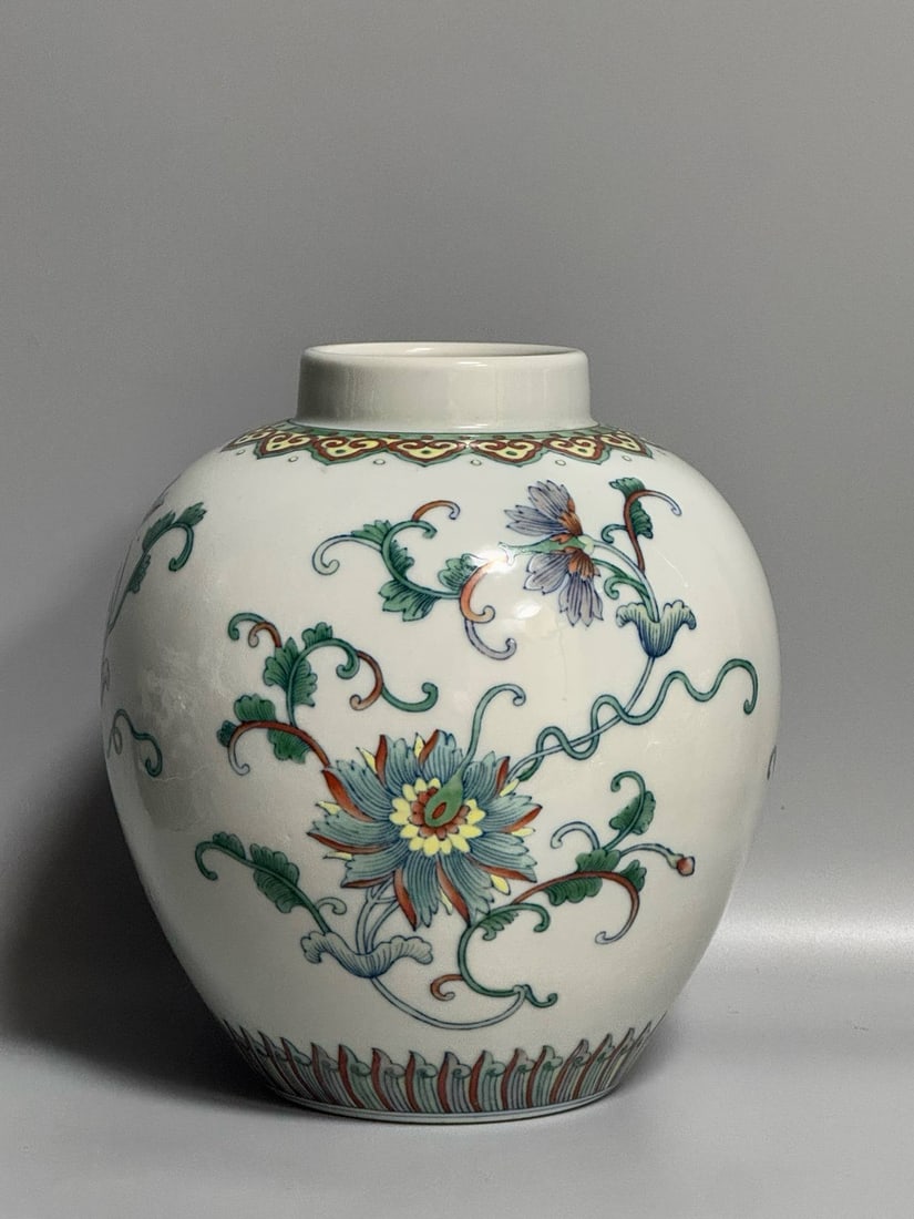 A Qianlong period (1736-1790) doucai (enamel overglaze enamel) floral jar (1 of 9)