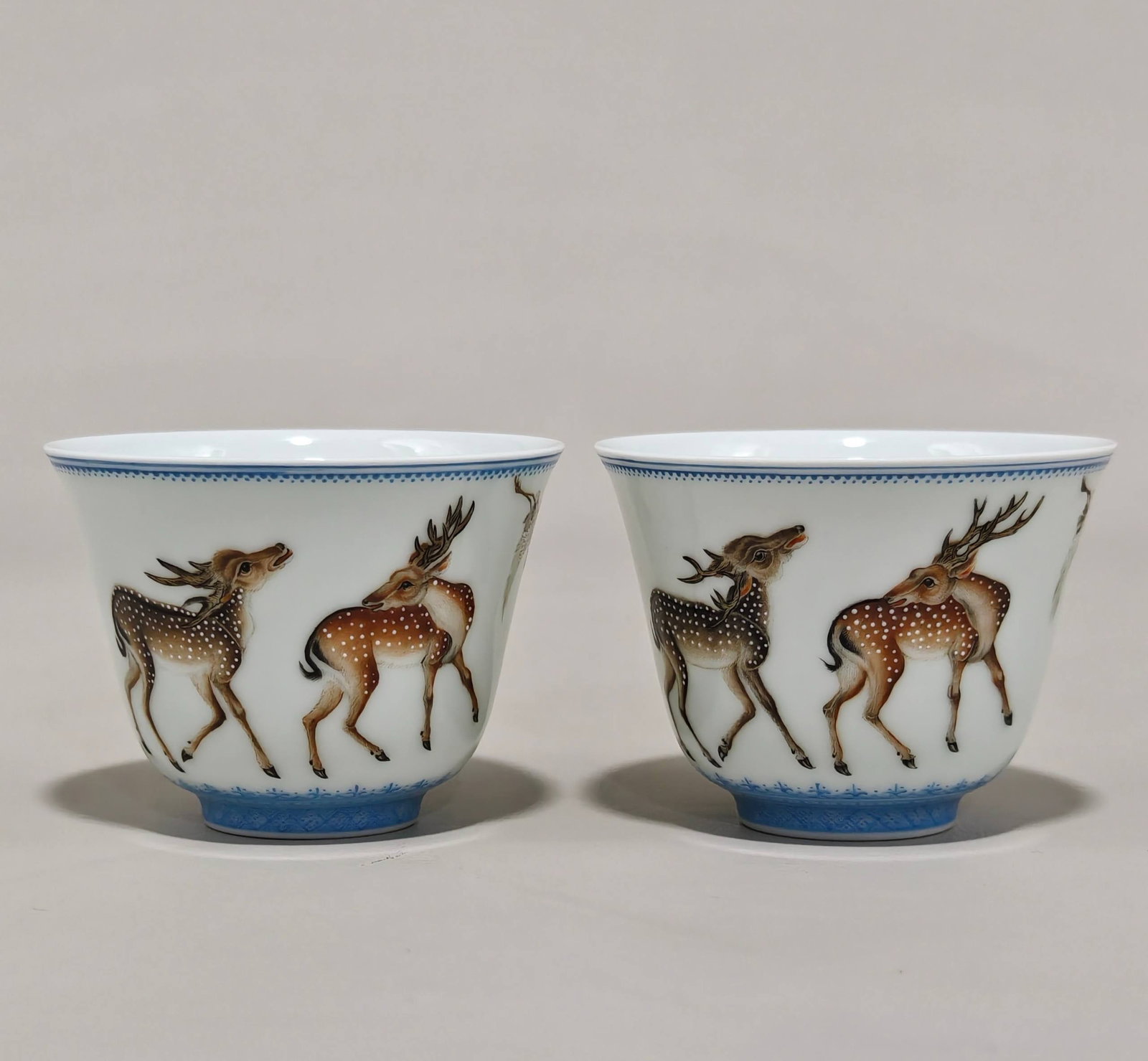 A Qing Dynasty Yongzheng period enamel-painted bell cup: A Qing Dynasty Yongzheng period enamel-painted bell cup with deer and crane design, 5.2 cm high and 6.8 cm in diameter.