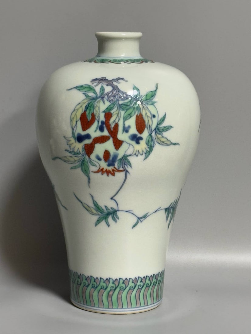 A Qing Dynasty Yongzheng period doucai (enamel overglaze) plum vase (1 of 9)