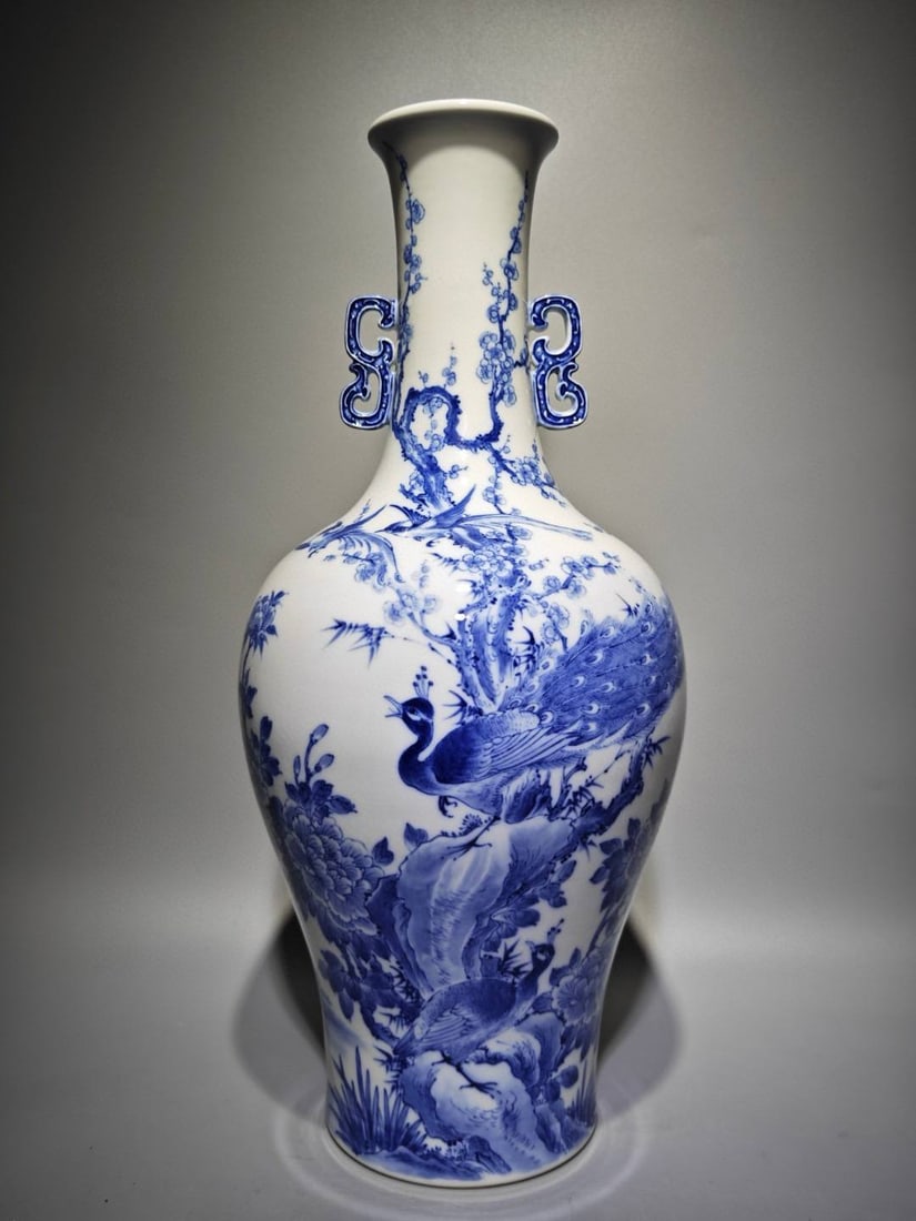 A blue and white porcelain vase with floral (1 of 8)
