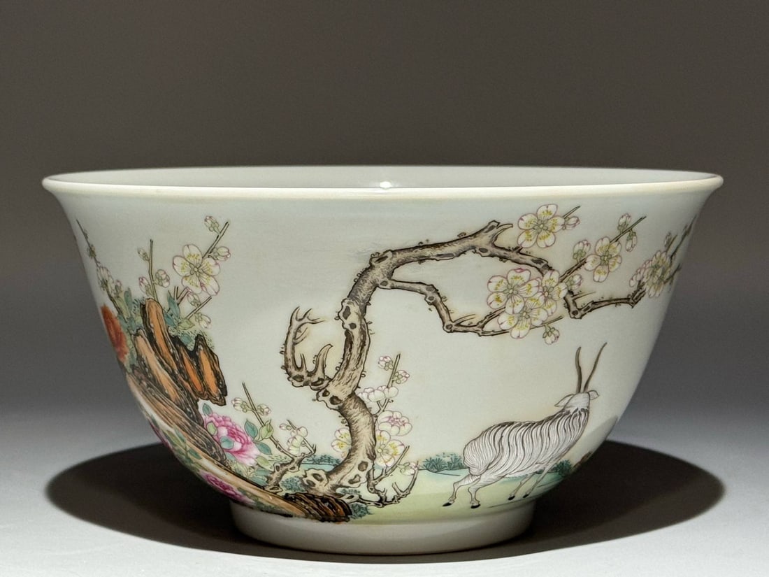 A large famille rose bowl with a "Three Rams Bringing Prosperity" design (1 of 7)