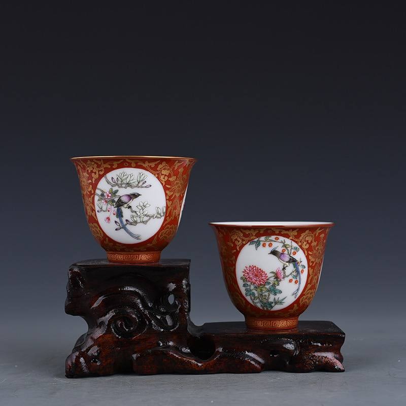 A Qing Dynasty Yongzheng period iron-red and gold-decorated openwork floral and bird cup: A Qing Dynasty Yongzheng period iron-red and gold-decorated openwork floral and bird cup, 7×8.6 cm