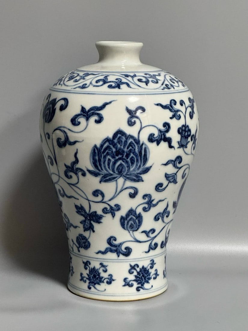 Ming Yongle blue and white plum vase with lotus scroll design: Ming Yongle blue and white plum vase with lotus scroll design, 26 cm high