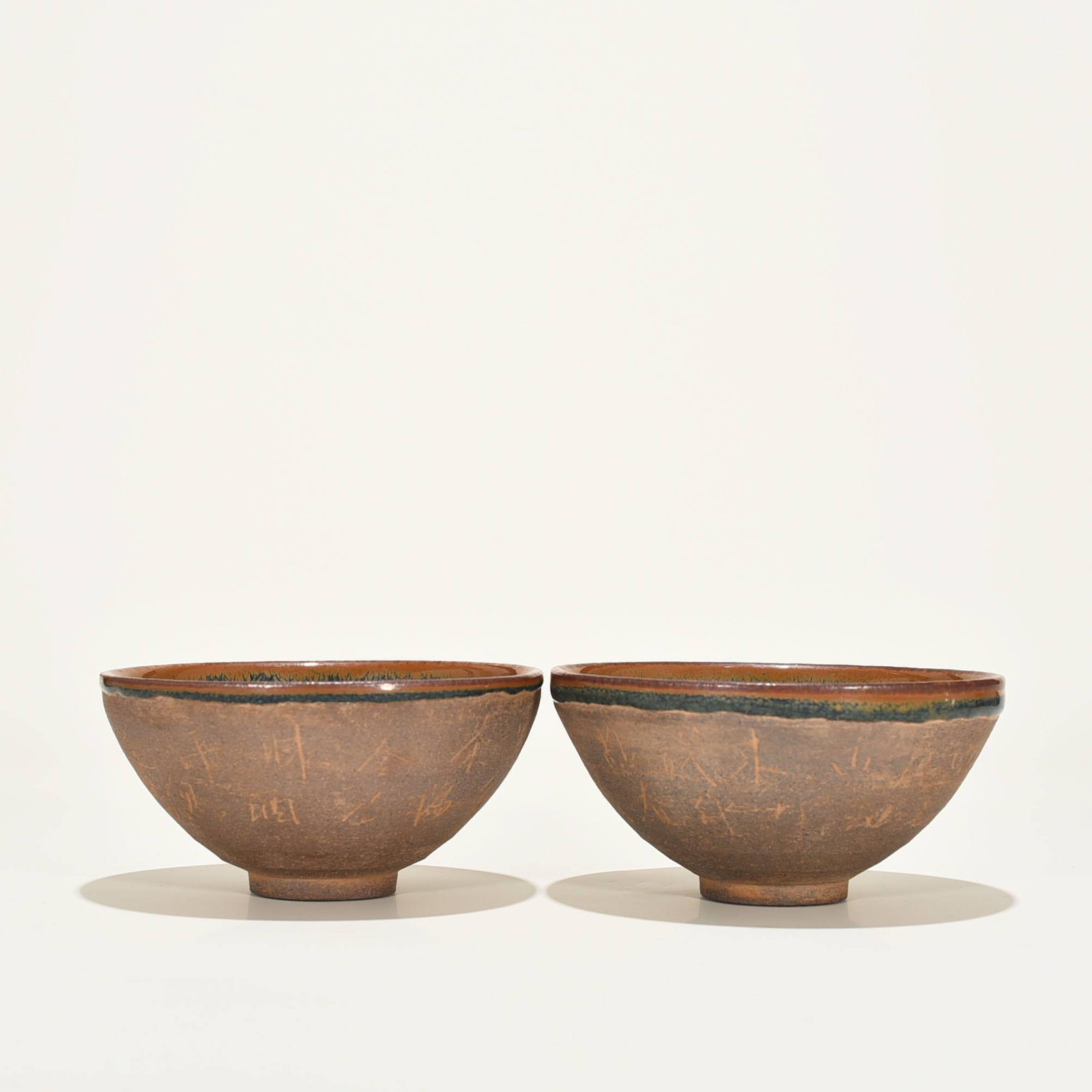 Song Dynasty Jian ware iridescent tea bowl with inscribed characters (1 of 8)