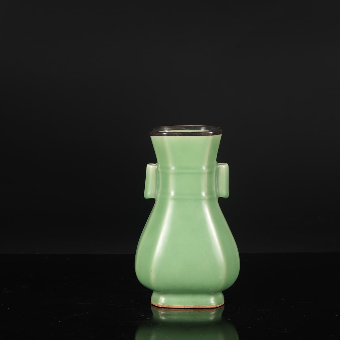 A Southern Song Dynasty Longquan celadon vase with silver-rimmed handles, formerly in my collection.: Dimensions: Height 22.5 cm, Mouth diameter 9 cm, Belly diameter 13 cm.