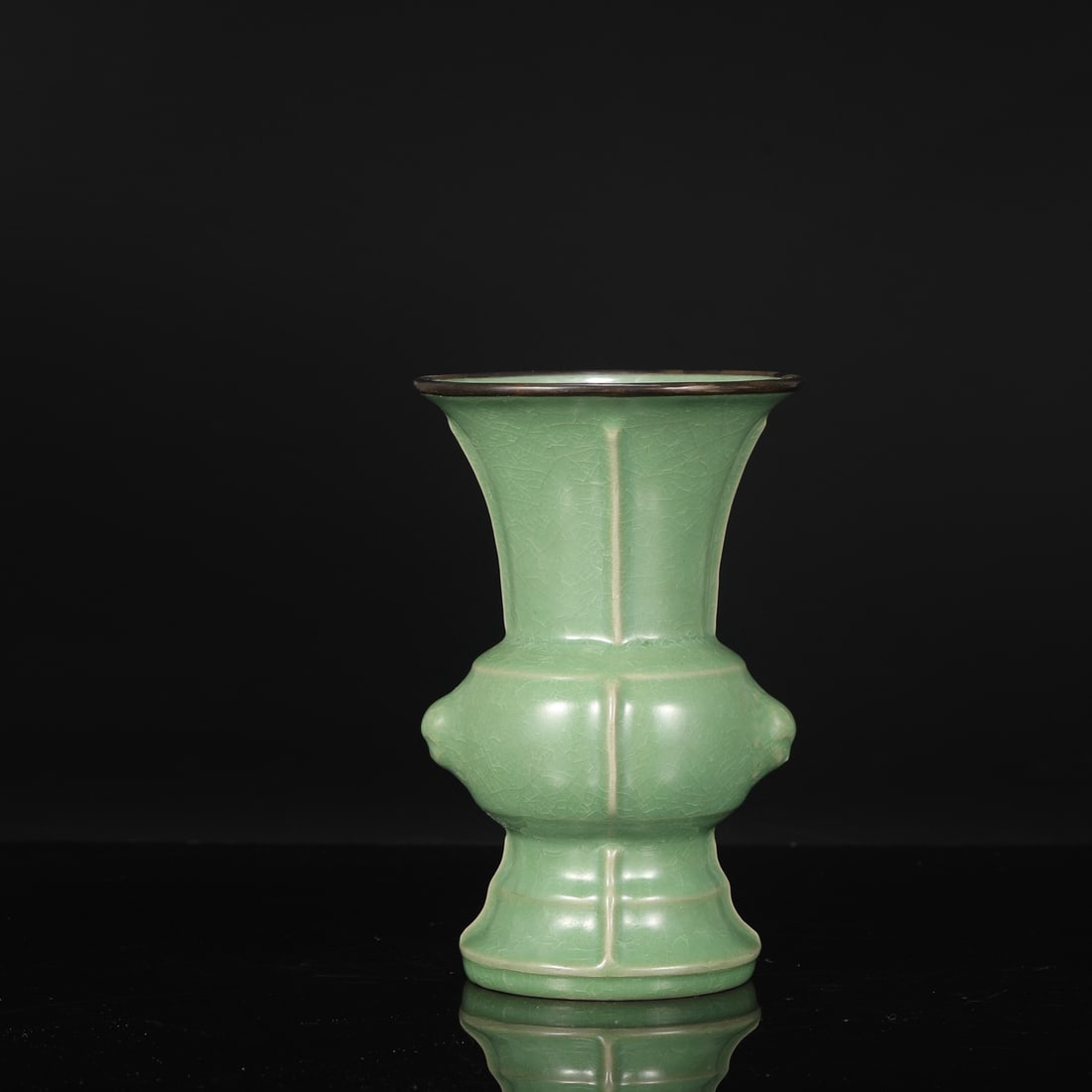 A Northern Song Dynasty Ru ware piece with a jade-green glaze, ice-crack pattern, and silver clasp,: Dimensions: Height 22 cm, Mouth Diameter 14 cm, Belly Diameter 13 cm.