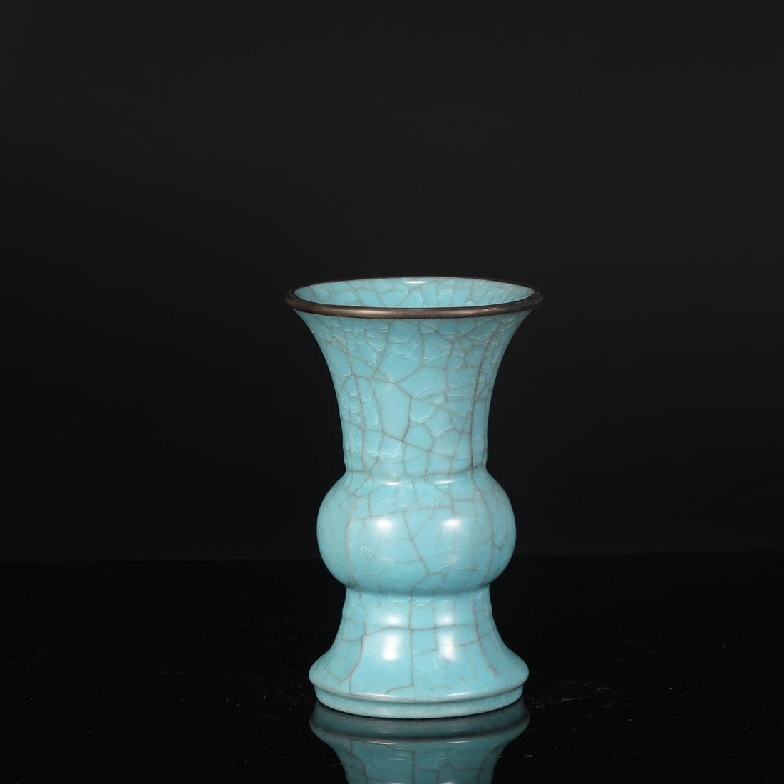 A Northern Song Dynasty Ru ware piece with sky-blue glaze, ice-crack pattern, and silver-inlaid: Dimensions: Height 22.5 cm, Mouth Diameter 14 cm, Belly Diameter 10 cm.