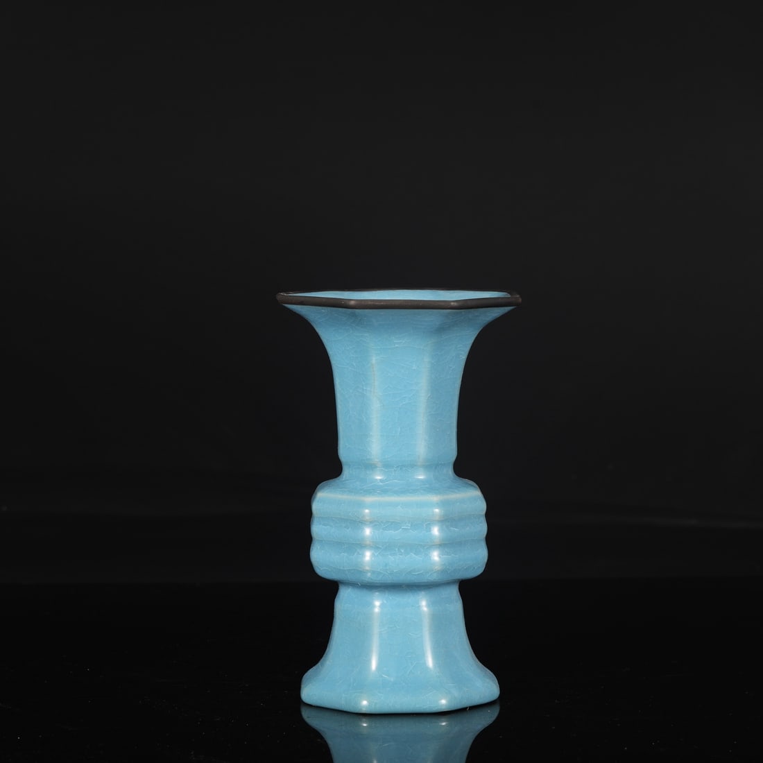 A Northern Song Dynasty Ru ware piece with sky-blue glaze, ice-crack pattern, and silver-inlaid: Dimensions: Height 22 cm, Mouth Diameter 13 cm, Belly Diameter 9.5 cm.