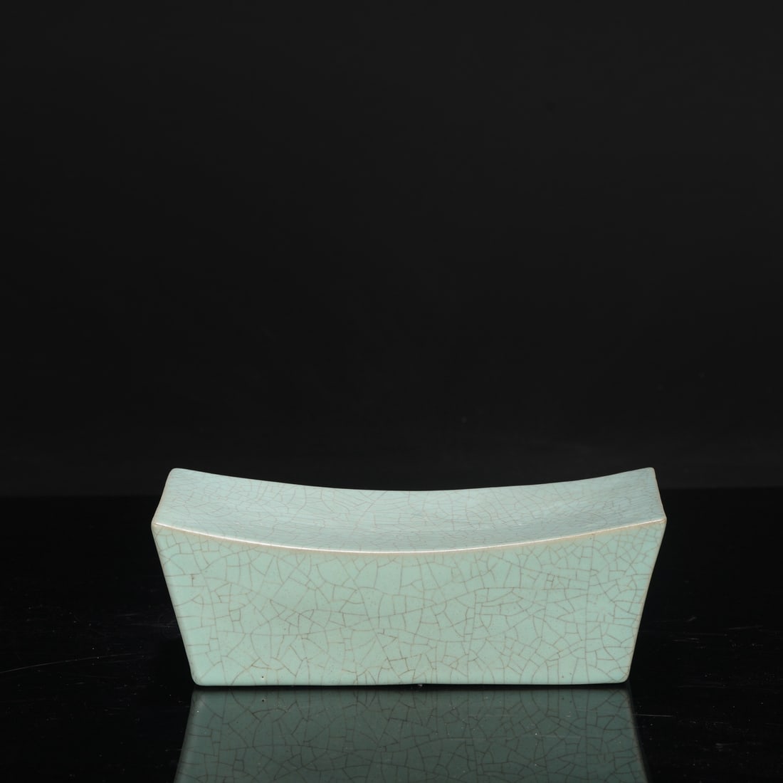 A large square porcelain pillow with a celadon glaze from the Northern Song Dynasty Ru kiln,: Dimensions: Height 8.5 cm, Length 24.5 cm, Width 10.5 cm.