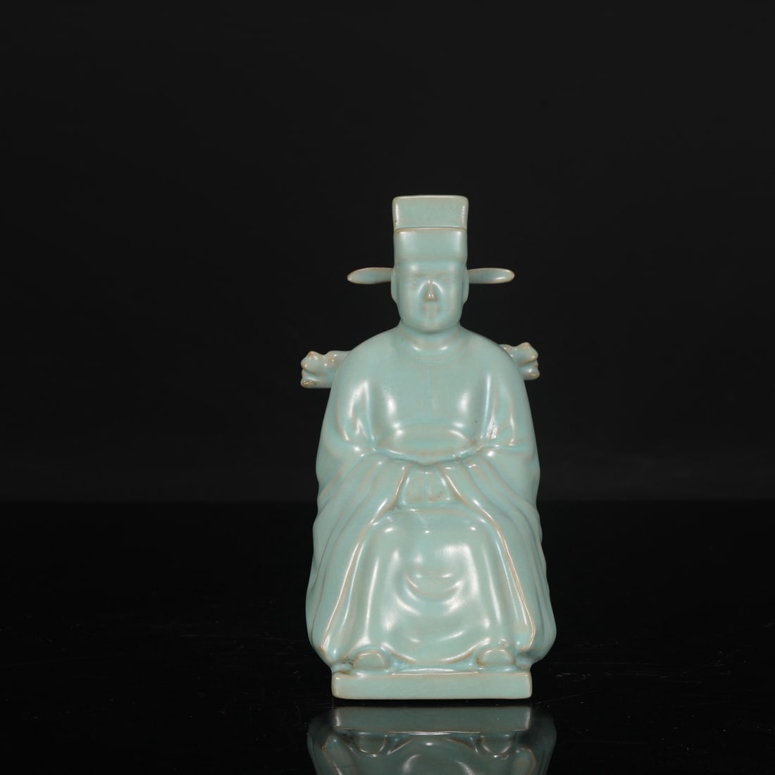 A Northern Song Dynasty Ru ware celadon seated statue of Emperor Huizong, formerly in a collection. (1 of 7)