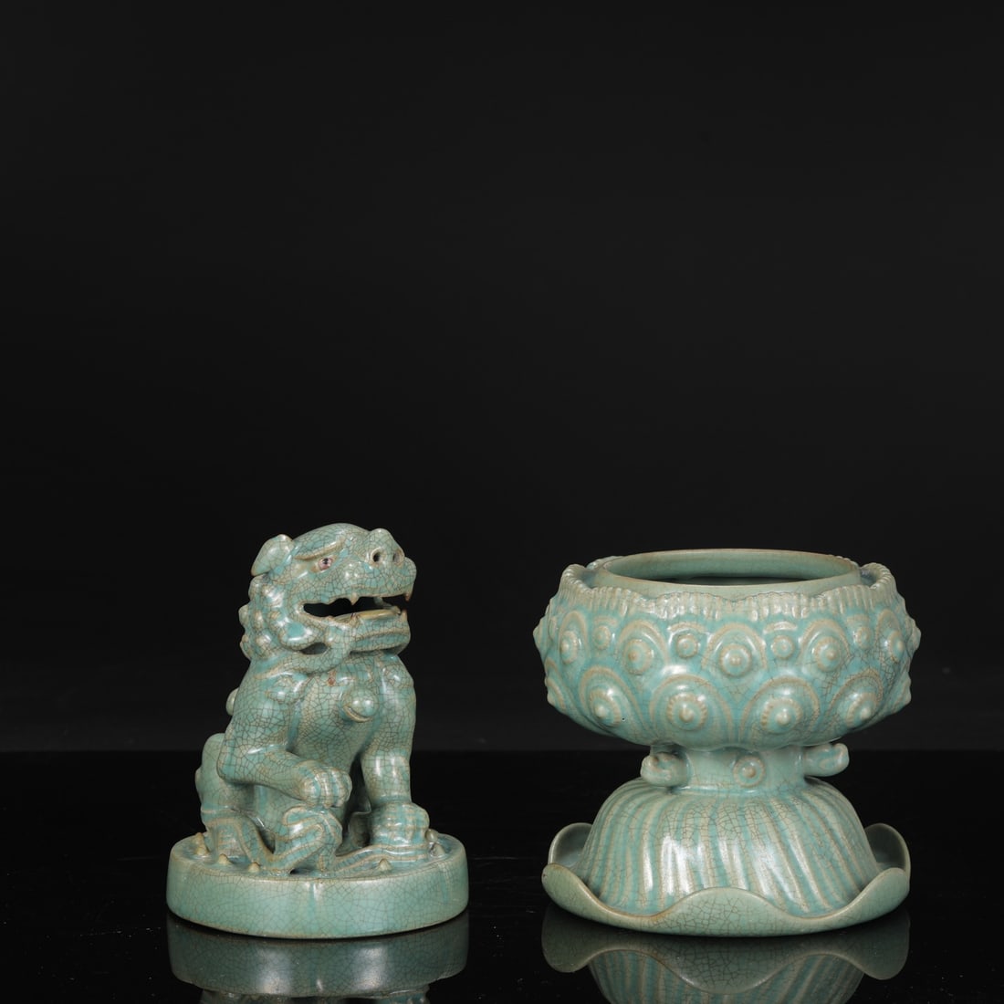 A Northern Song Dynasty Ru ware celadon-glazed lion and beast covered jar and large incense burner: Dimensions: Height 34 cm, Mouth diameter 11.5 cm, Belly diameter 17.5 cm.