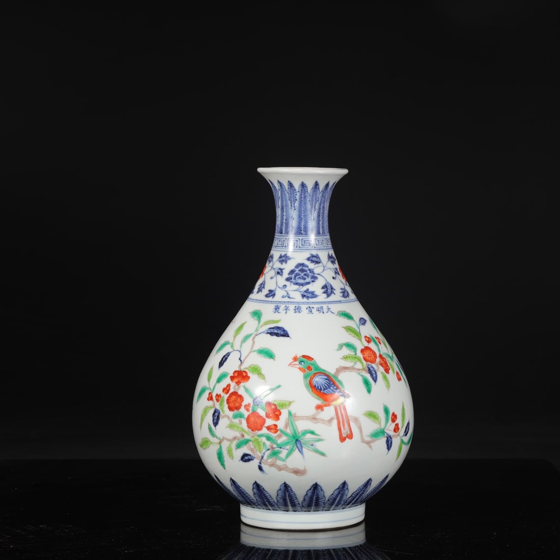 A large Ming Dynasty Xuande period blue and white porcelain vase with polychrome floral and bird: Dimensions: Height 33 cm, Mouth diameter 8 cm, Belly diameter 19.5 cm.