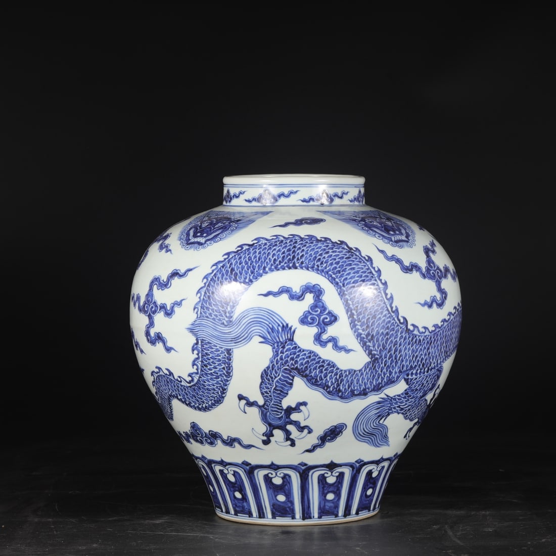 A large blue-and-white porcelain jar with taotie and cloud dragon design from the Xuande period of: Dimensions: Height 41 cm, Mouth diameter 17 cm, Belly diameter 36 cm