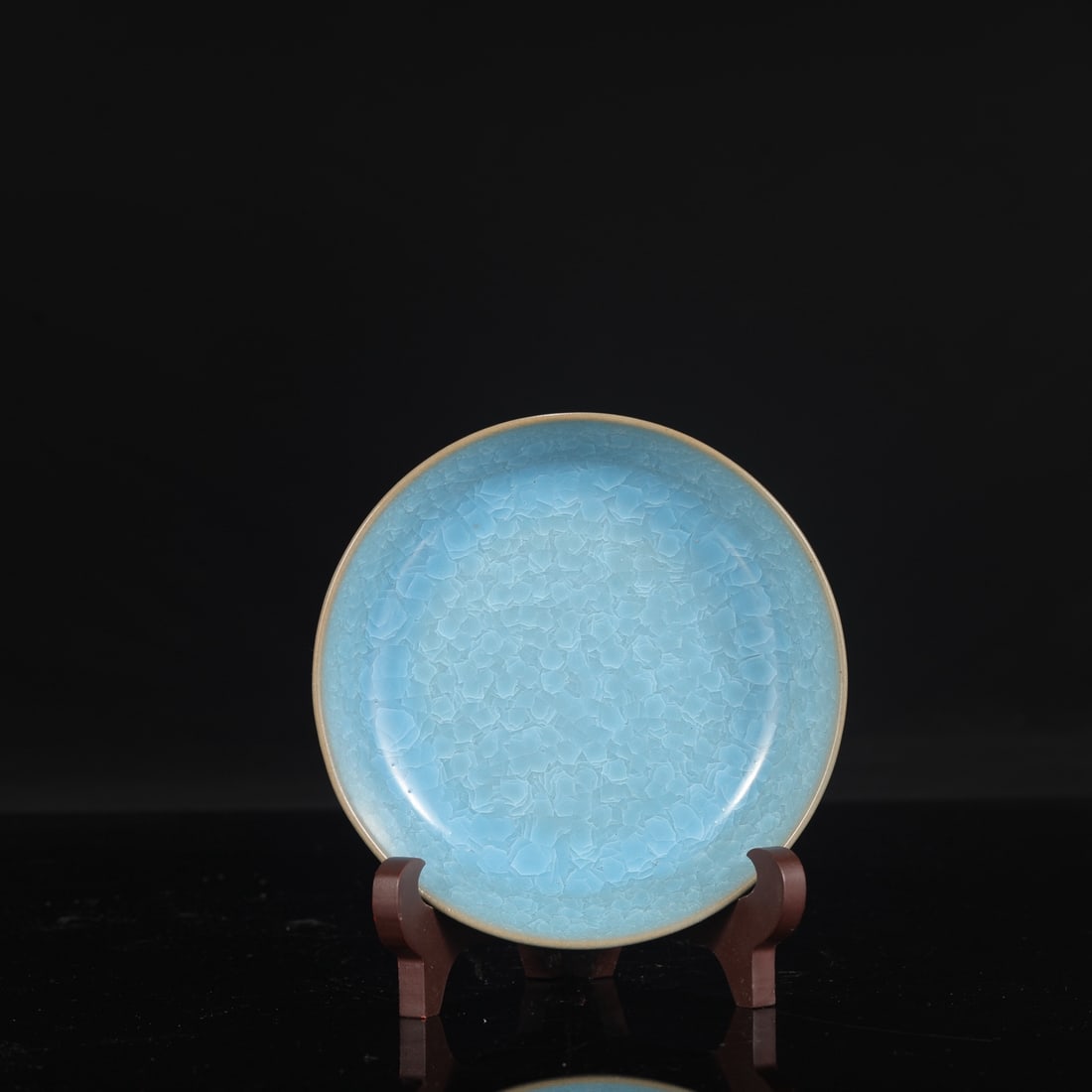 A Northern Song Dynasty Ru ware sky-blue glazed round washer with ice-crack pattern, formerly in the: Height: 4 cm, Diameter: 14.5 cm