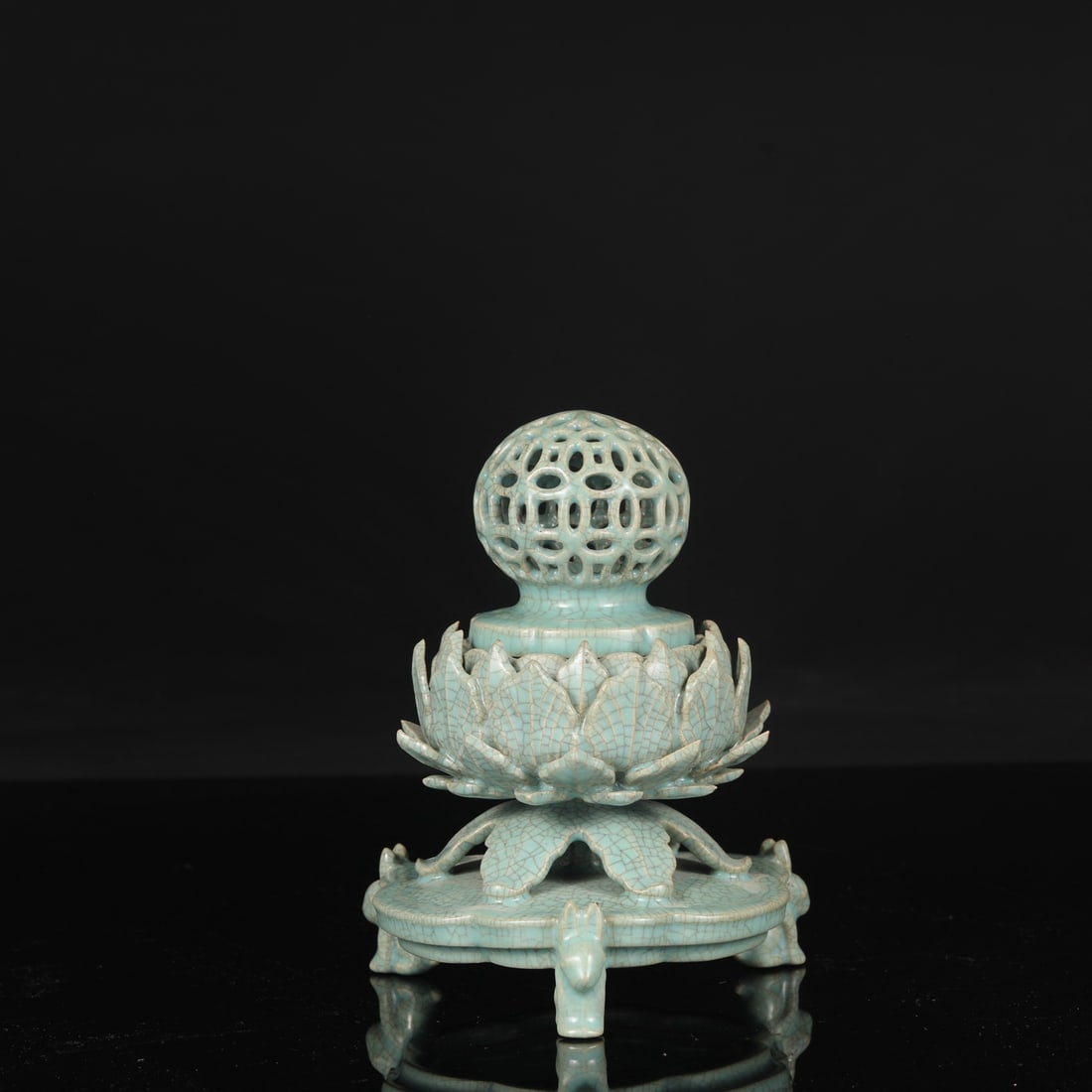 A Northern Song Dynasty Ru ware celadon-glazed covered jar with lotus petal decoration, formerly in: Height: 19.5 cm, Mouth diameter: 5.5 cm, Belly diameter: 15 cm